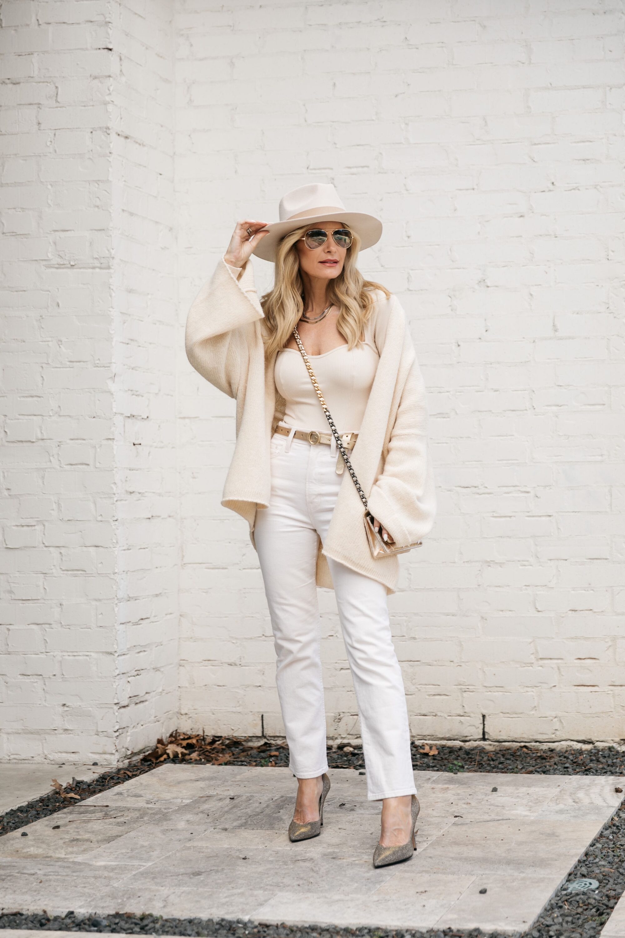 Dallas woman over 40 wearing ivory hat