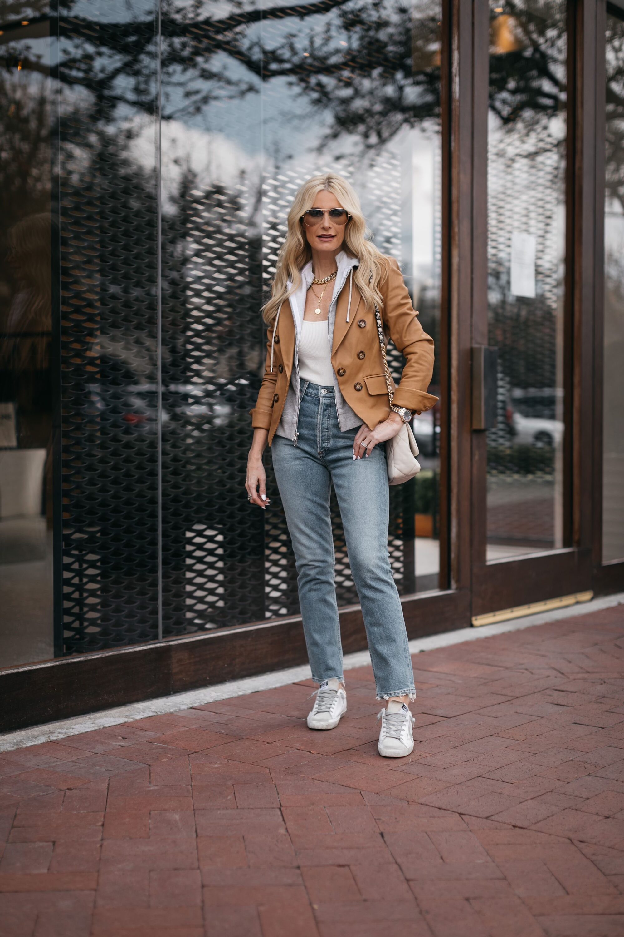 Dallas fashion blogger over 40 wearing casual camel blazer, grey dicky, golden goose sneakers