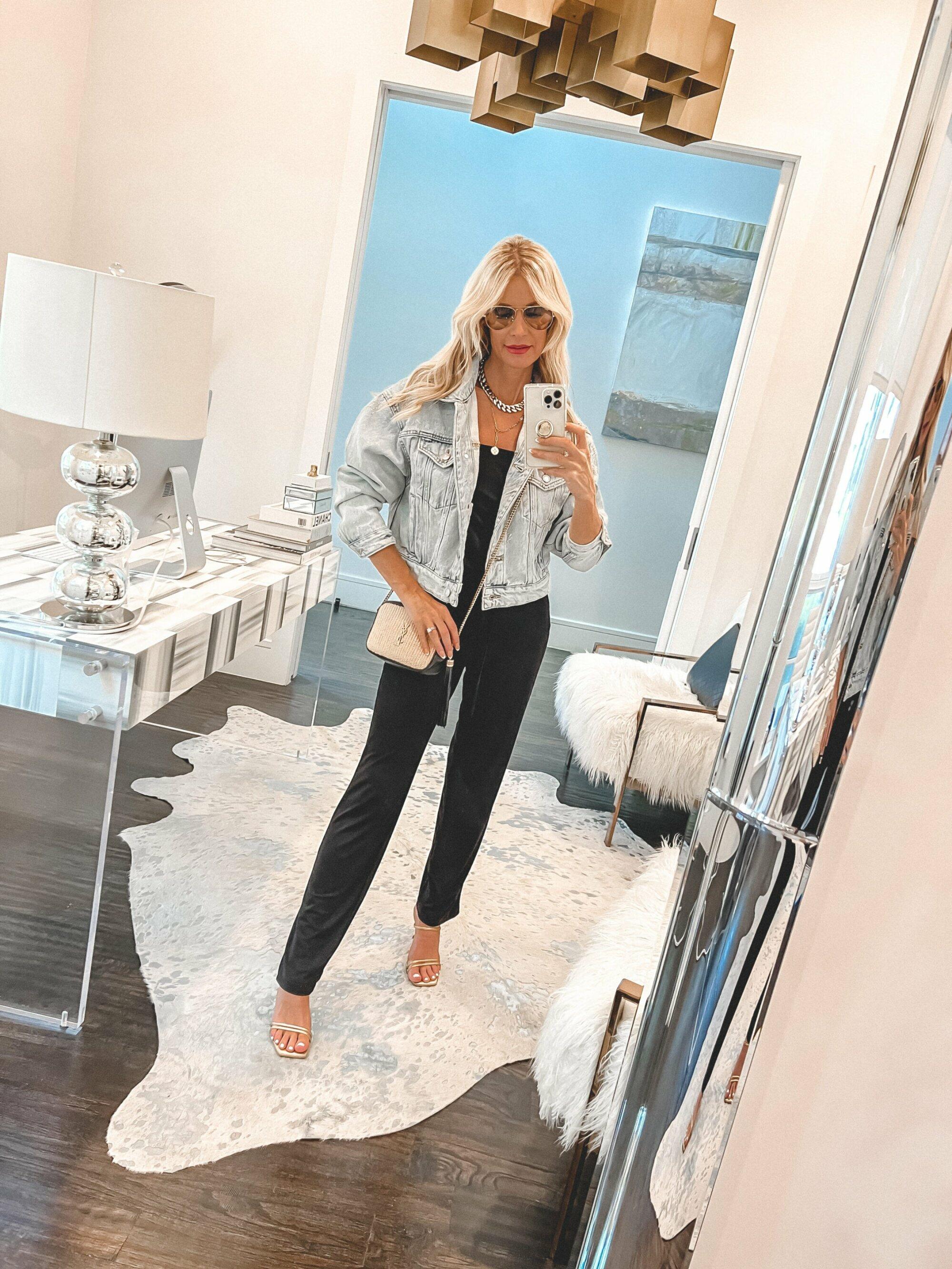 Woman over 40 wearing Michael Stars jumpsuit with denim jacket