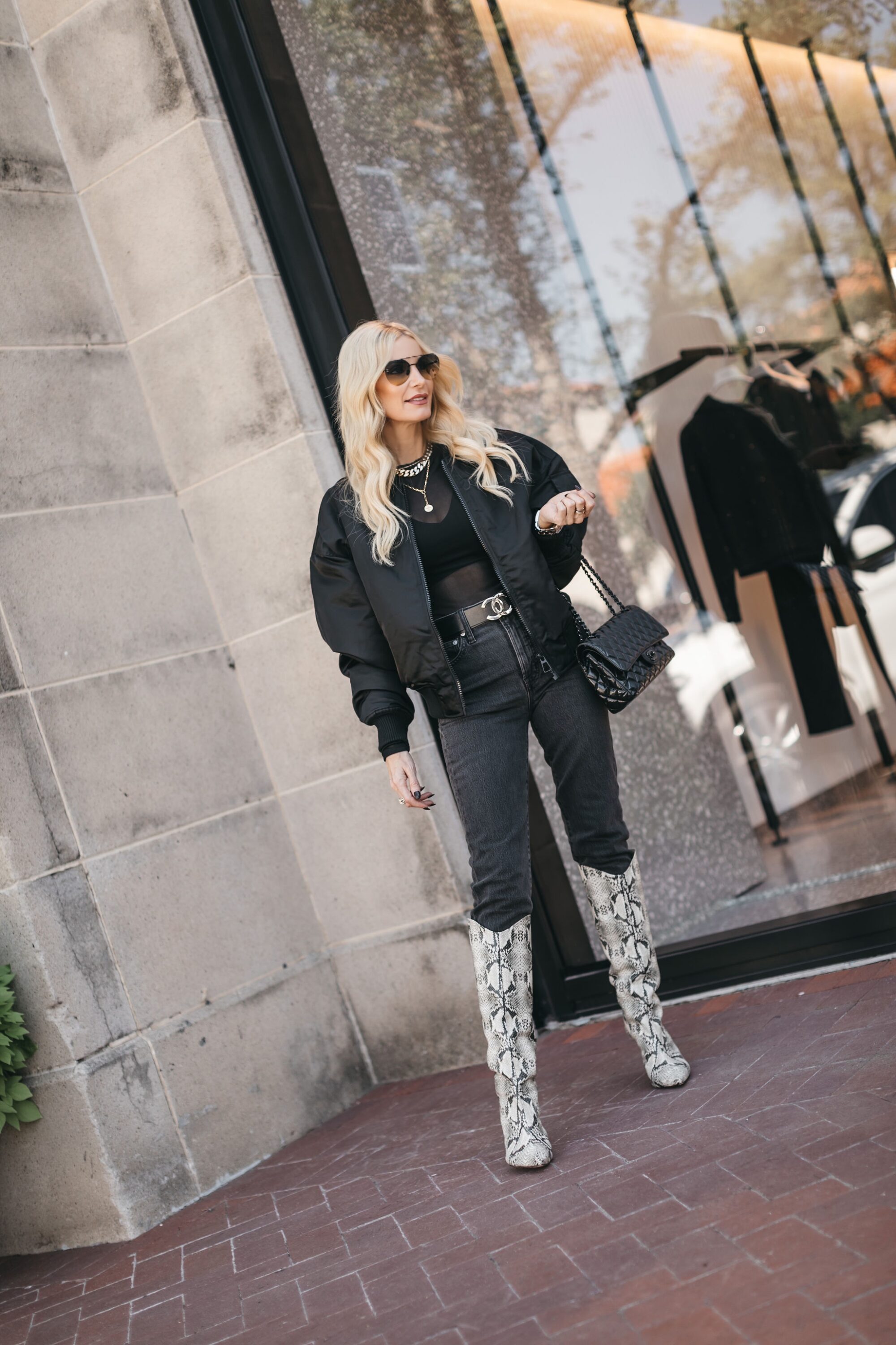 Dallas fashion blogger wearing satin bomber jacket, mesh bodysuit and modern skinny jeans as fall wardrobe basics.