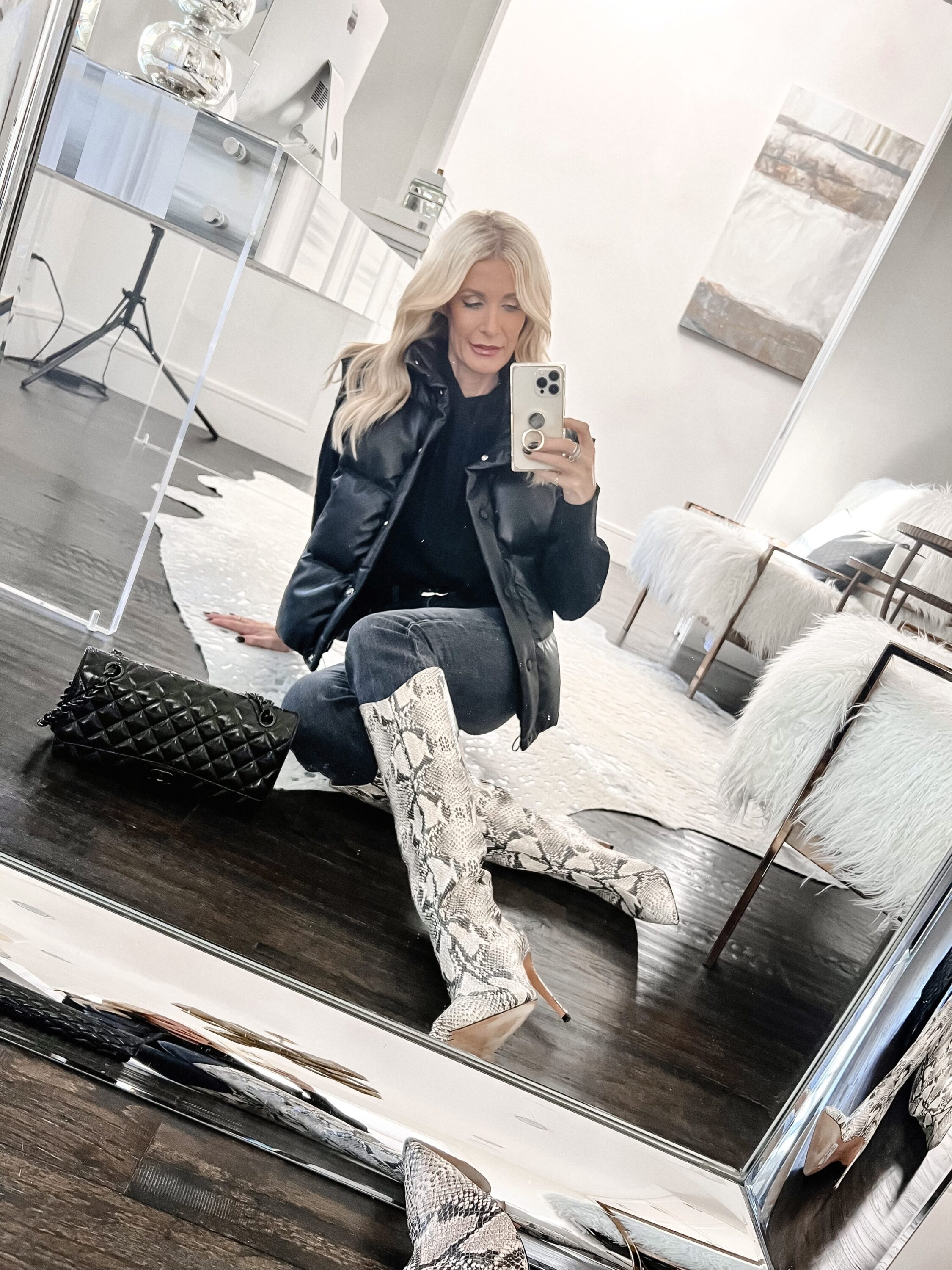 Dallas fashion blogger over 40 showing how to style boots.