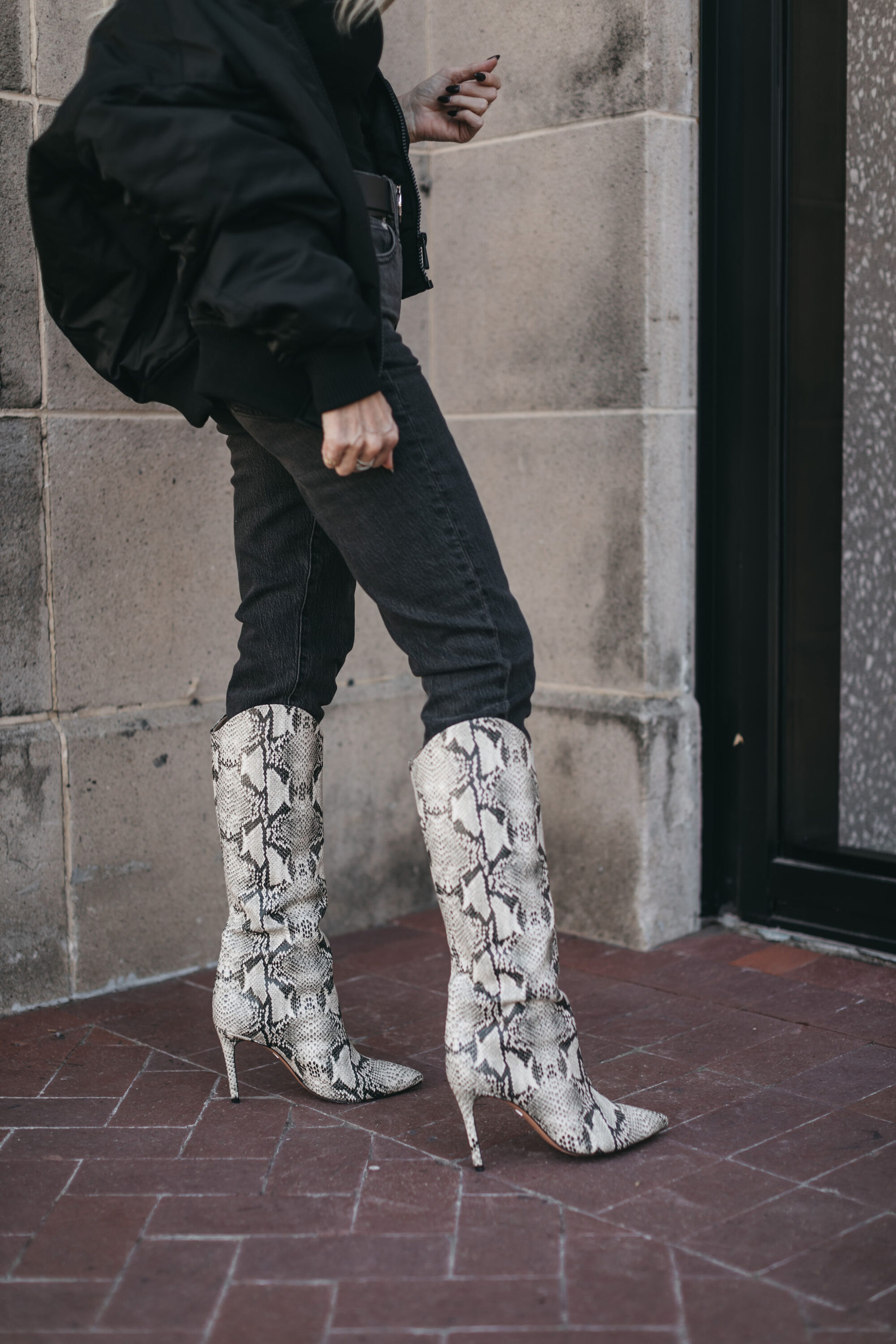 Dallas fashion blogger wearing knee high boots as an example of fall wardrobe basics.