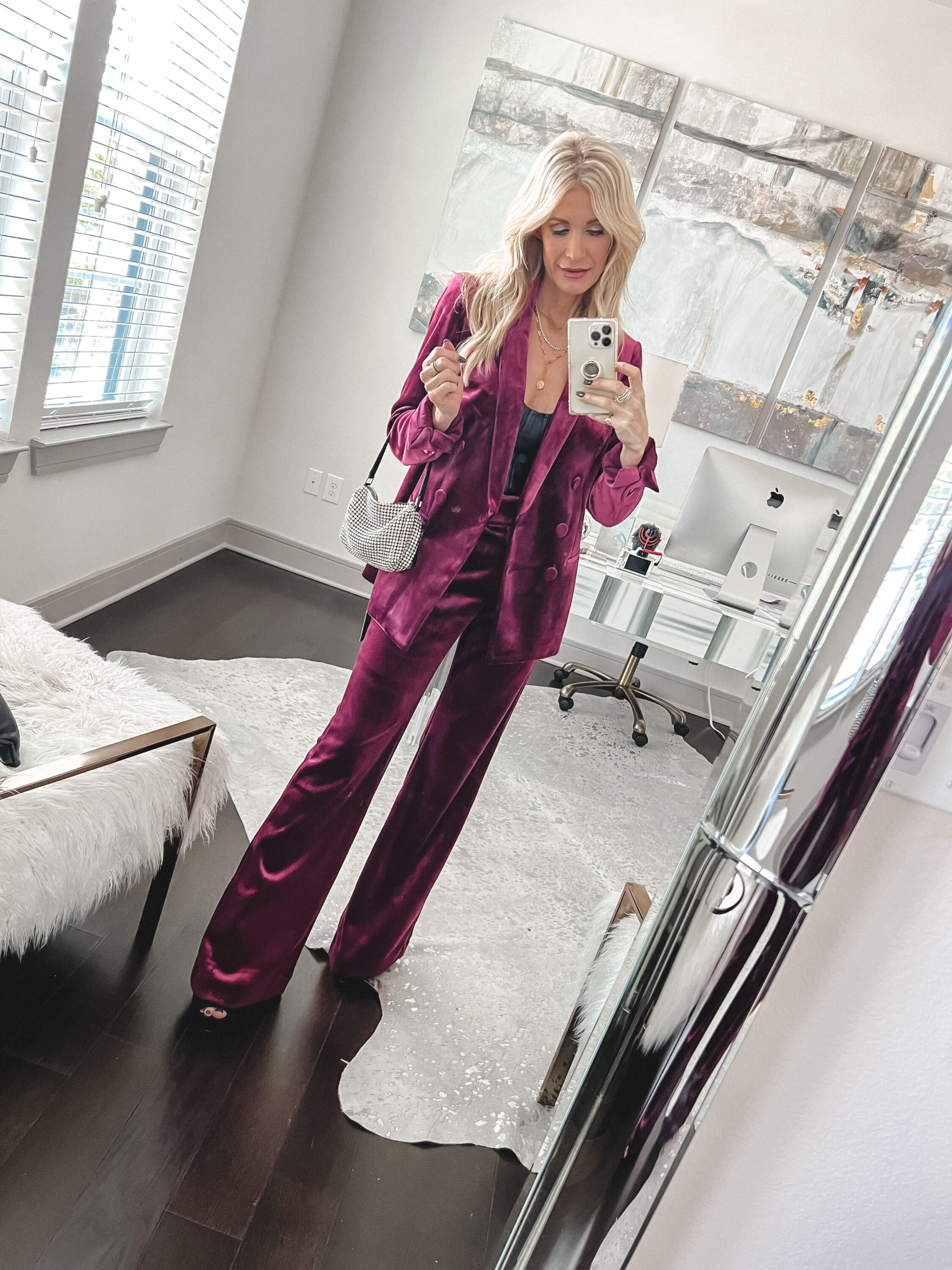 Dallas fashion blogger wearing pink velvet blazer and pants suit with black faux leather corset top as part of one Best Black Friday Sales of 2022.