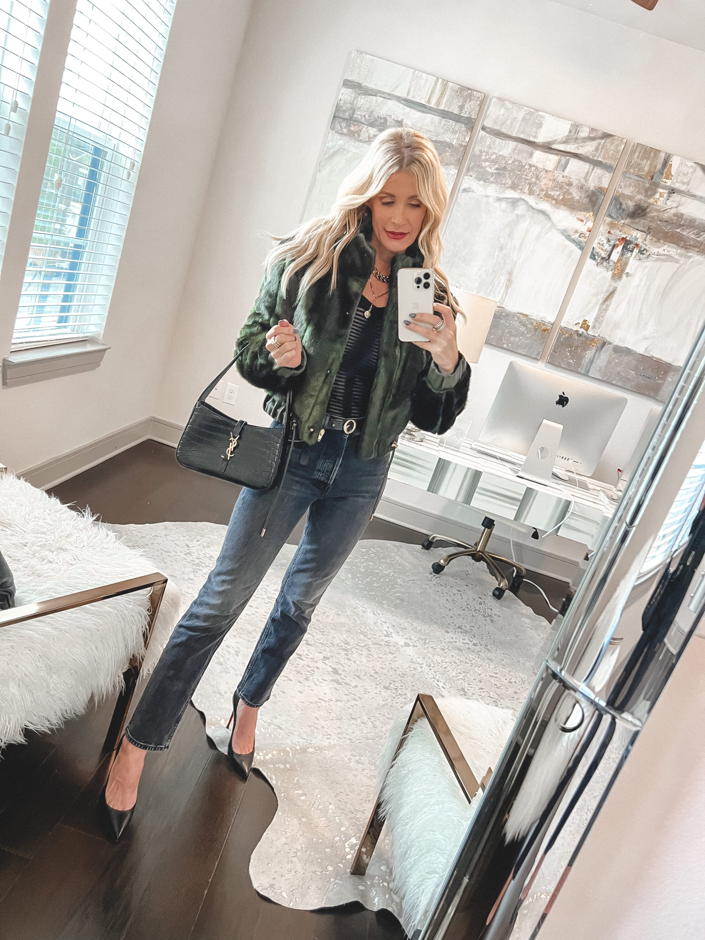 Over 40 fashion blogger wearing olive green fauc fur jacket with all black base layer for what to wear when you think you have nothing to wear.
