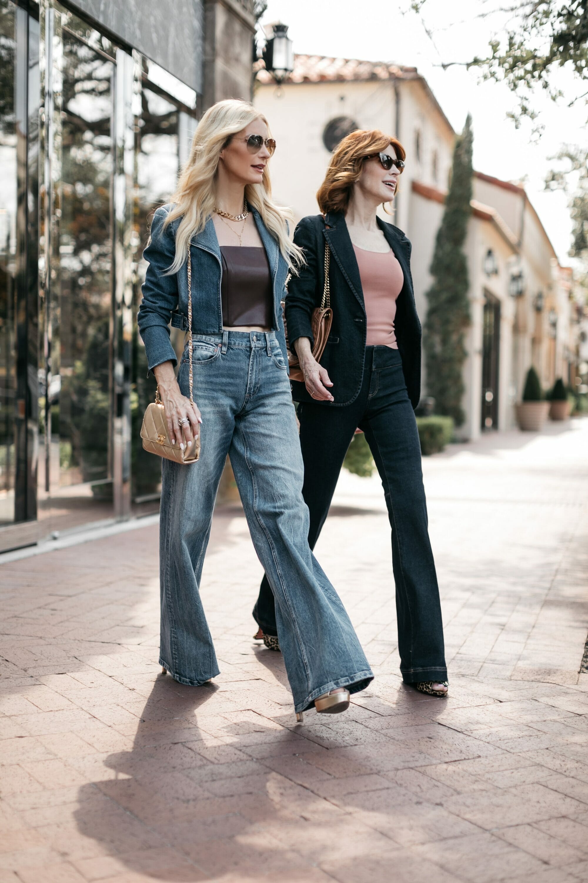 2 over 40 fashion influencers wearing veronica beard denim as one of the top denim trends of 2023.