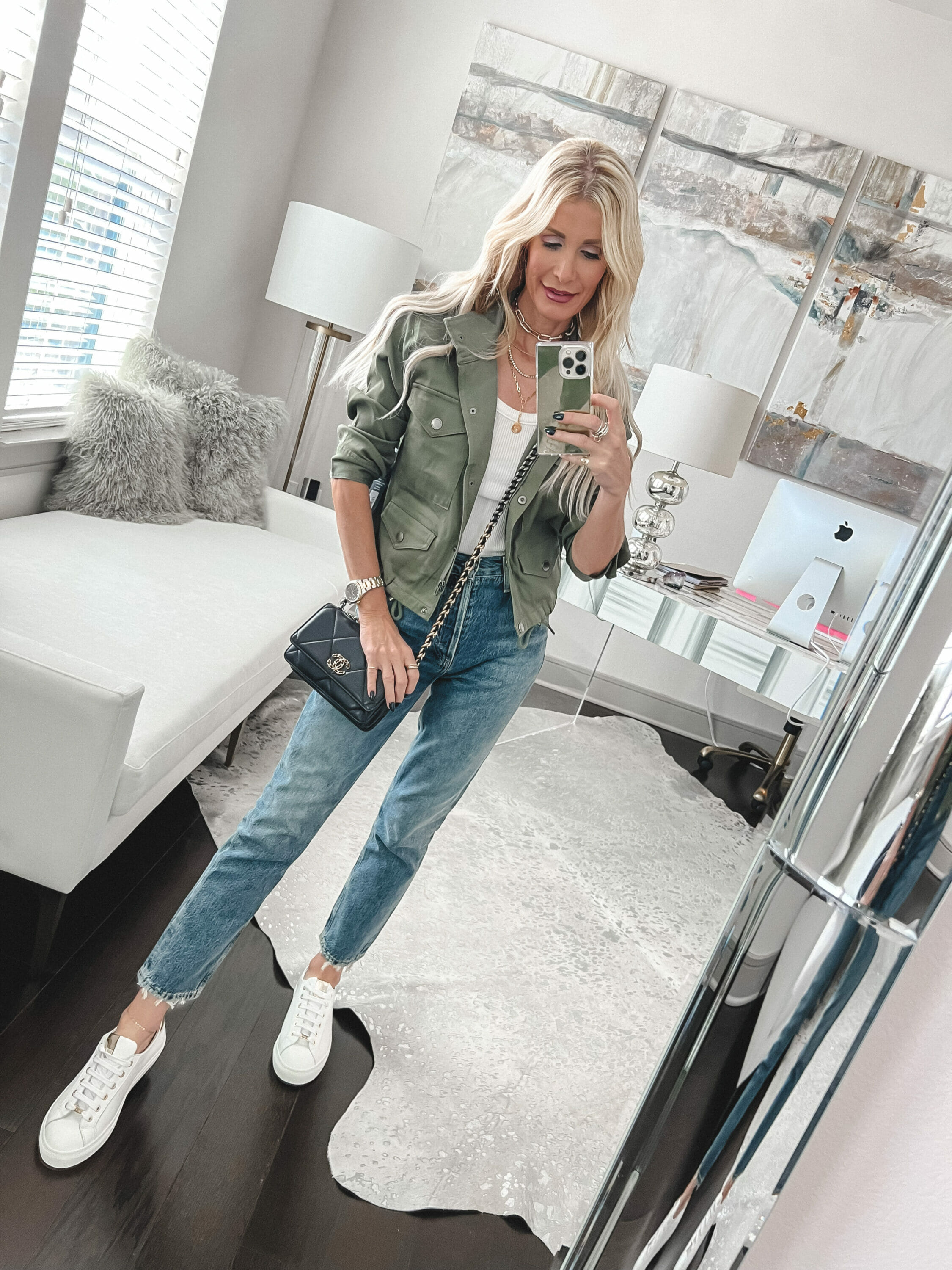 Dallas fashion stylist for women over 40 wearing sleek white sneakers instead of golden goose sneakers.