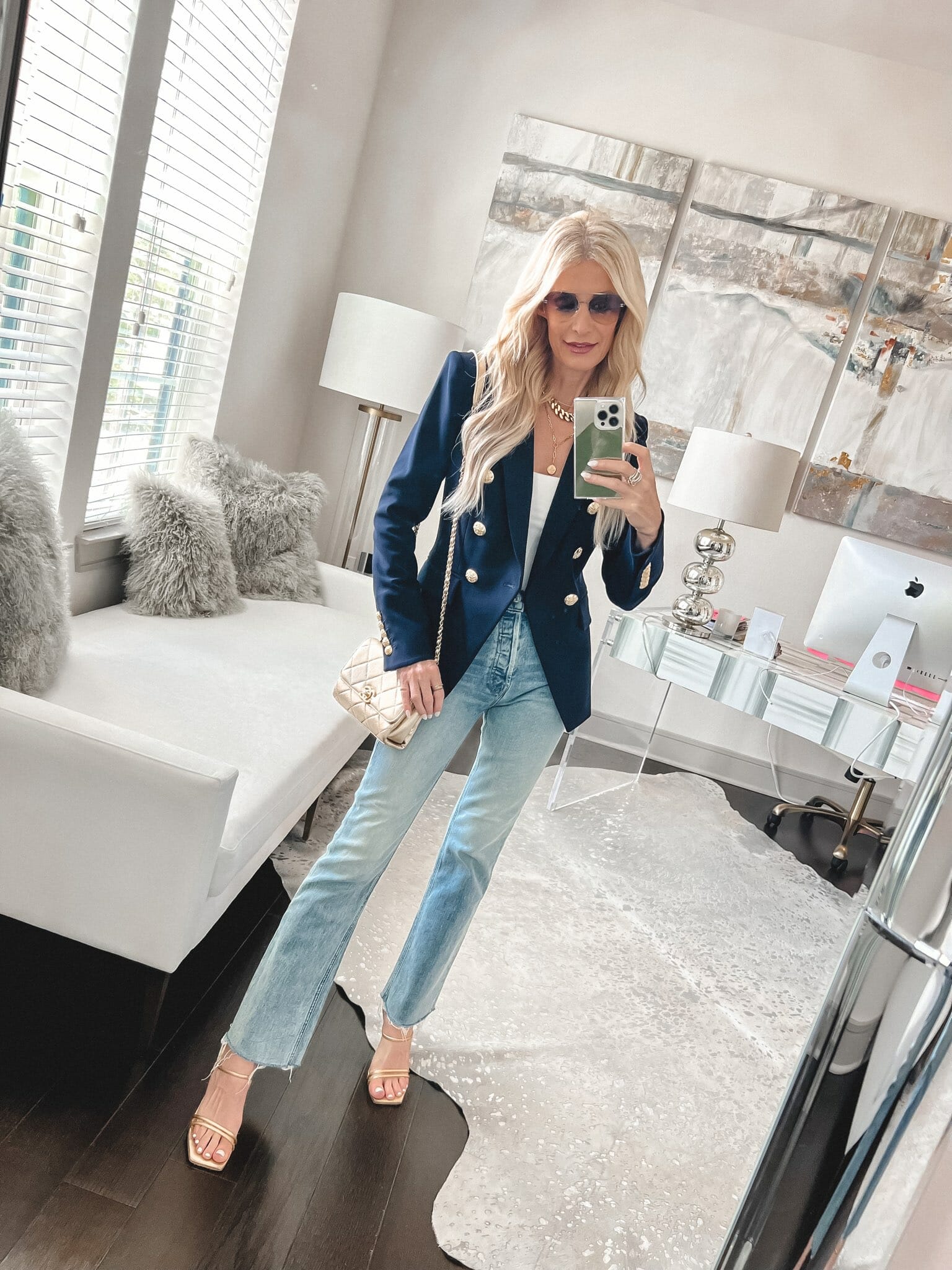 Over 40 fashion blogger wearing veronica beard blazer as one of 5 wardrobe investment pieces.