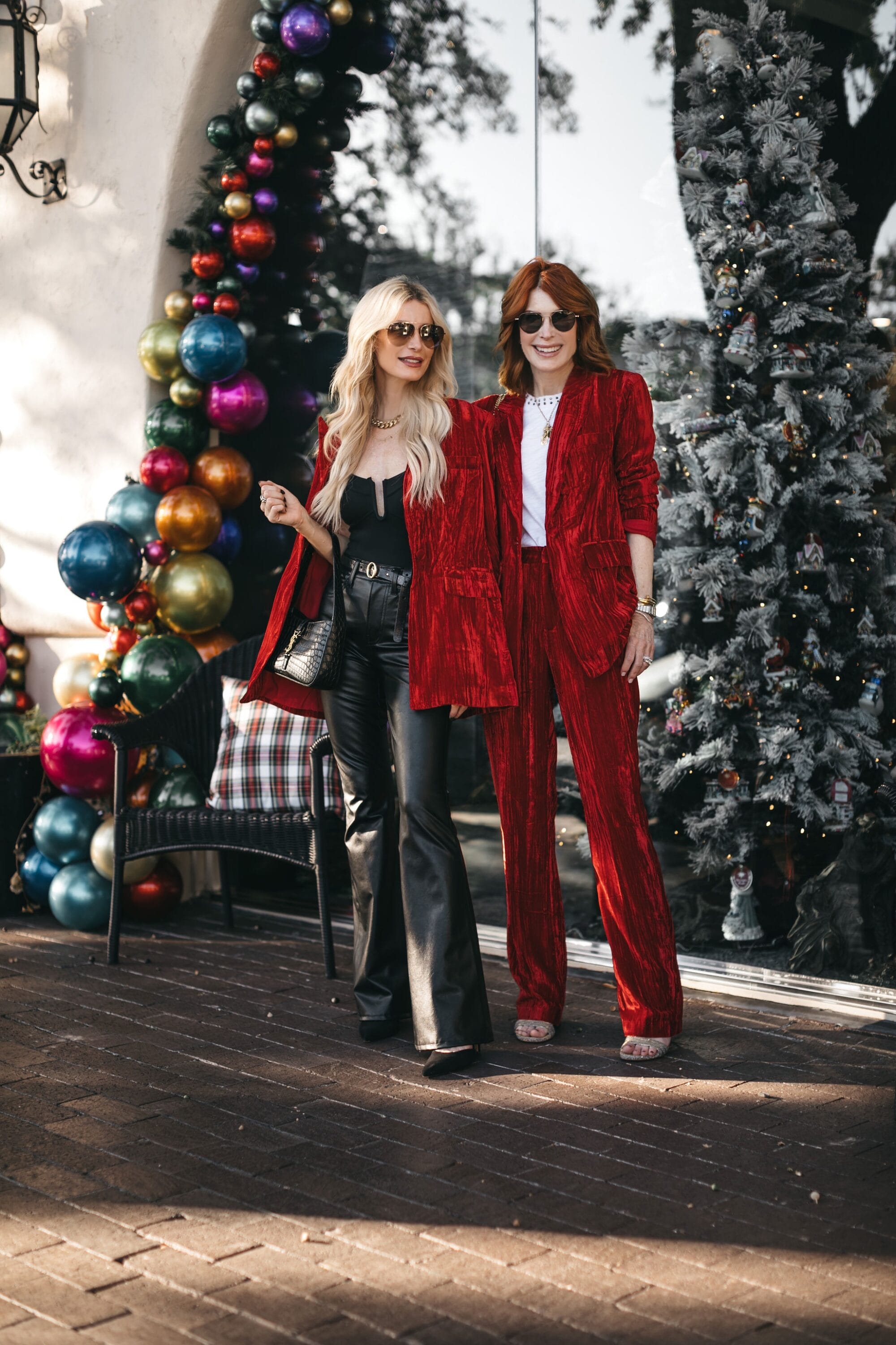 Over 50 fashion bloggers a red velvet blazer over all black & the matching pants as 2 of the hottest holiday looks for women over 40.