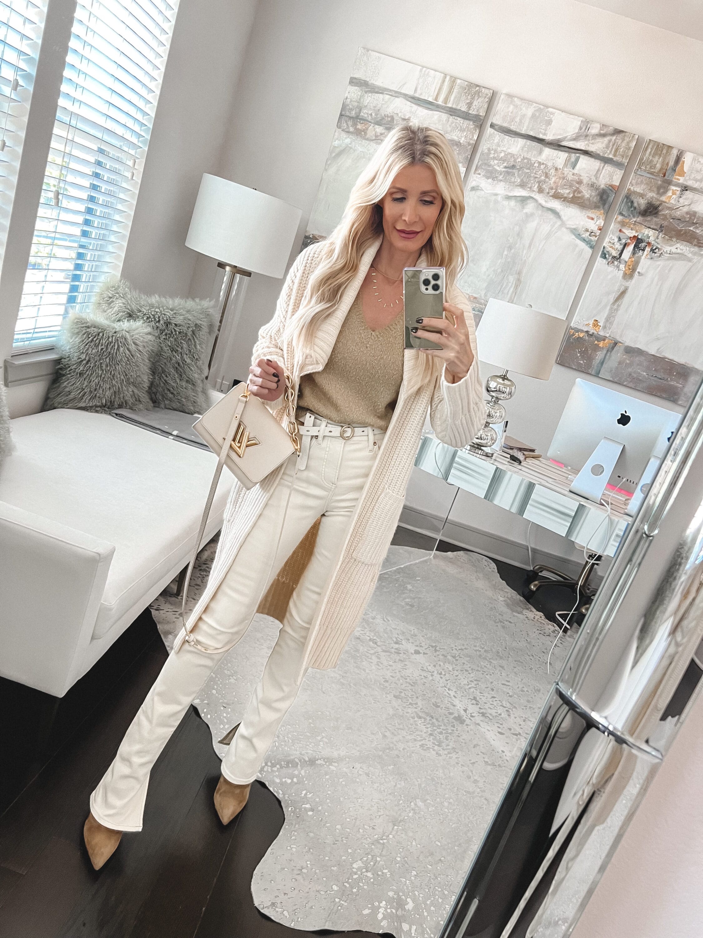 Dallas fashion blogger over 40 wearing an ivory cardigan and ivory jeans as 2 of the Best Black Friday Sales of 2023.
