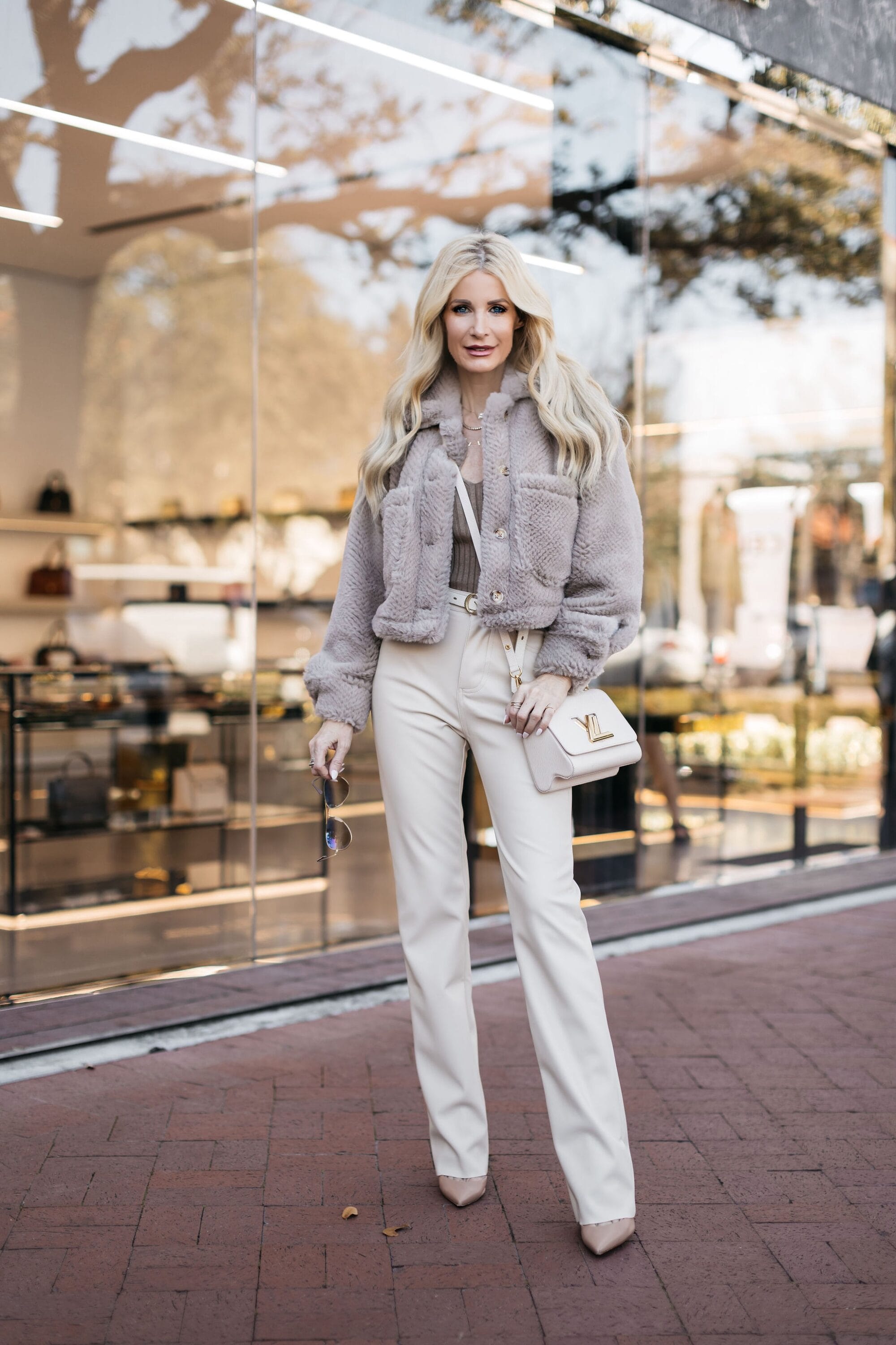 Over 40 fashion blogger from Dallas showcasing the most expensive looking color combinations in 3 chic looks.