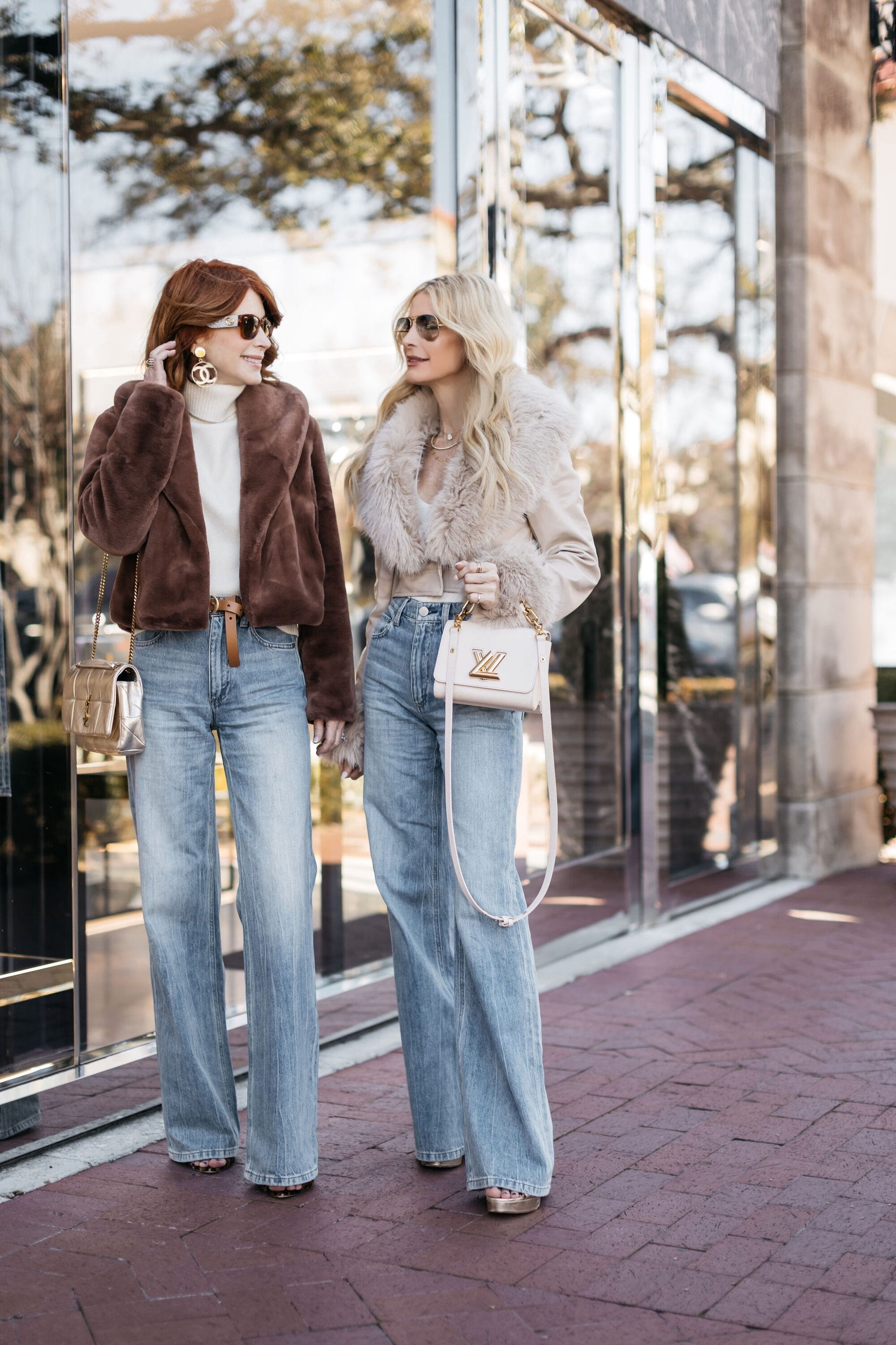 Over 40 fashion influencers wearing wide leg jeans with with faux fur jackets as 2 examples of how to style wide-leg jeans.