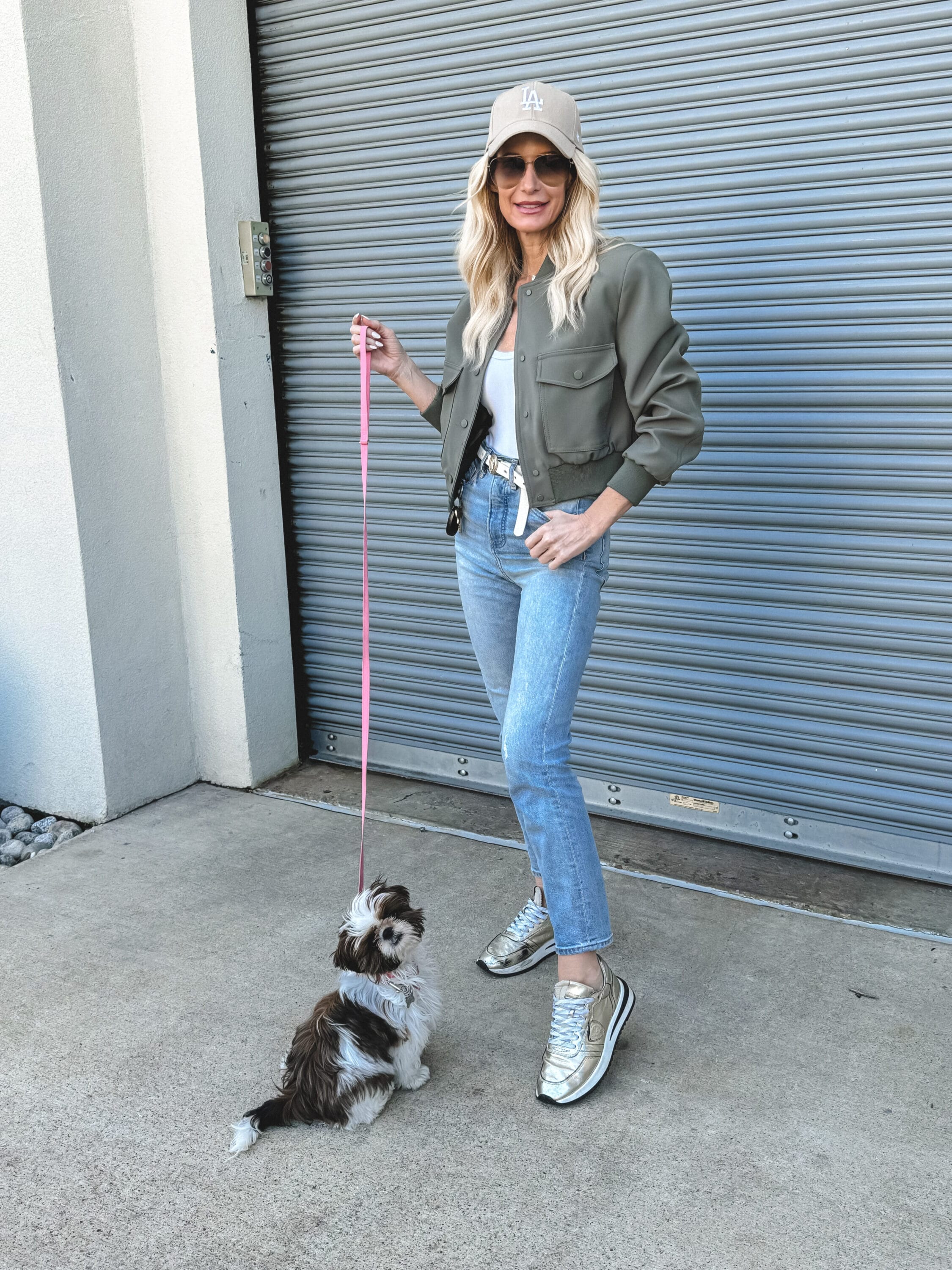 Over 40 fashion blogger from Dallas showcasing how to style sneakers in 4 chic looks.