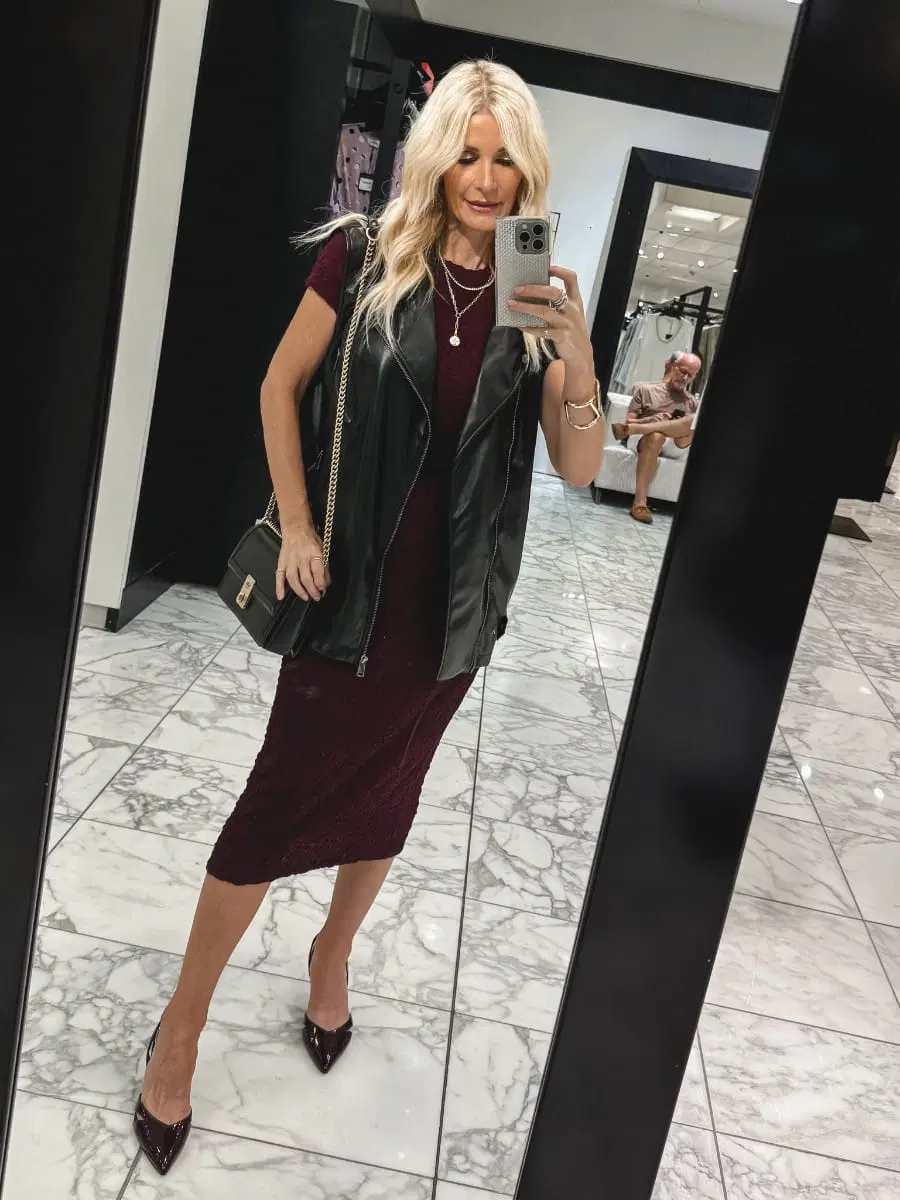 Over 40 fashion influencer from Texas wearing a matching burgundy set with a faux leather vest as one of the top under $100 finds from the Nordstrom Anniversary Sale.
