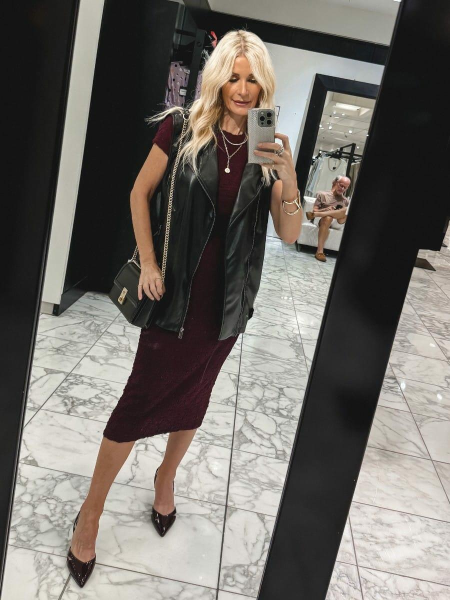 Over 40 fashion influencer from Dallas wearing a smocked matching tee and skirt set with a faux leather vest as one of 10 stylish outfits from the Nordstrom Anniversary Sale.