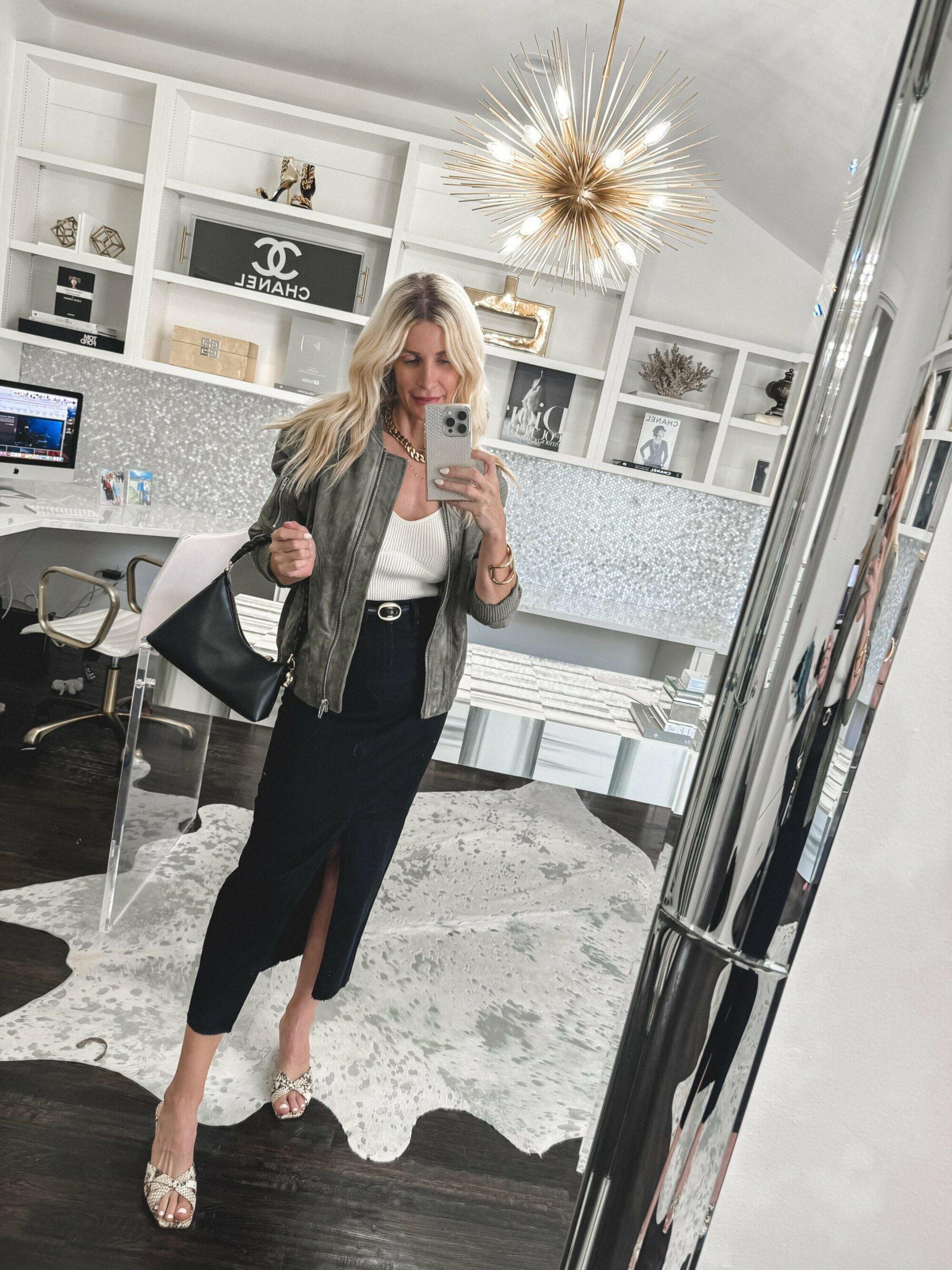 Dallas fashion influencer for women over 40 showcasing a green suede jacket as one of fall's hottest color trends.