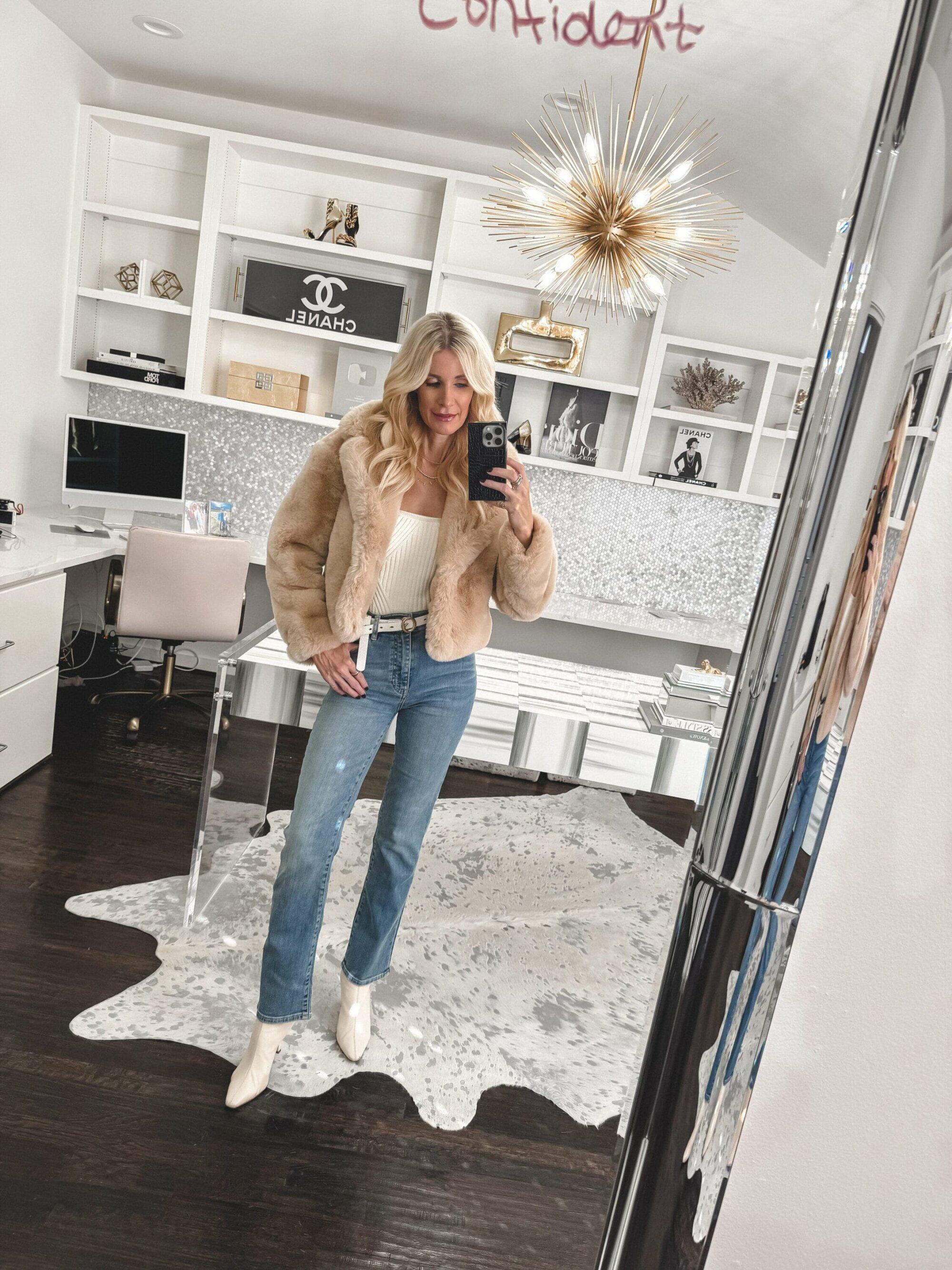 Dallas fashion influencer for women over 40 wearing an under $100 blanknyc jacket and straight leg jeans.