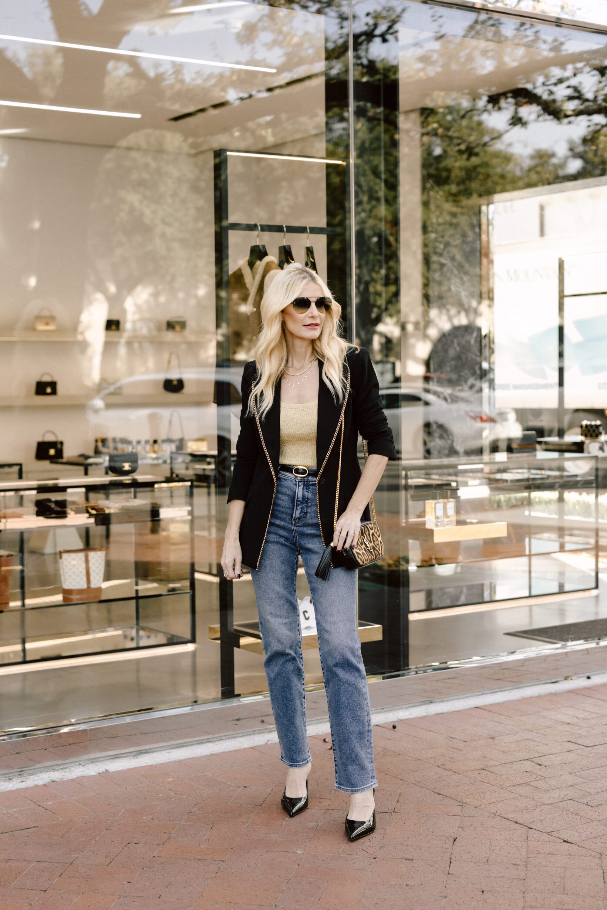 Dallas fashion influencer for women over 40 wearing pointed toe mules as one of the hottest 2025 shoe trends.