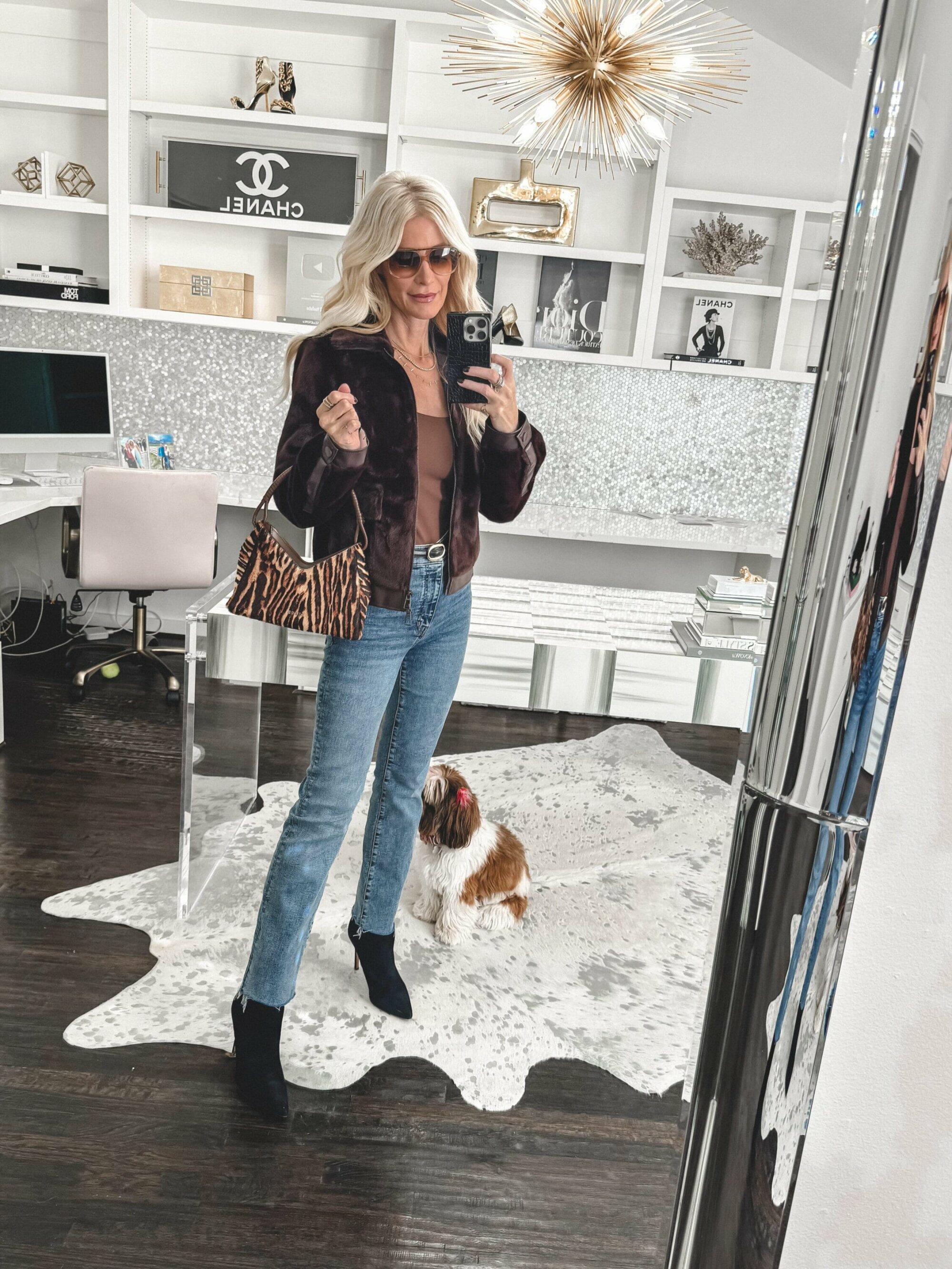 Dallas fashion blogger over 40 wearing modern skinny jeans with a brown faux fur coat.