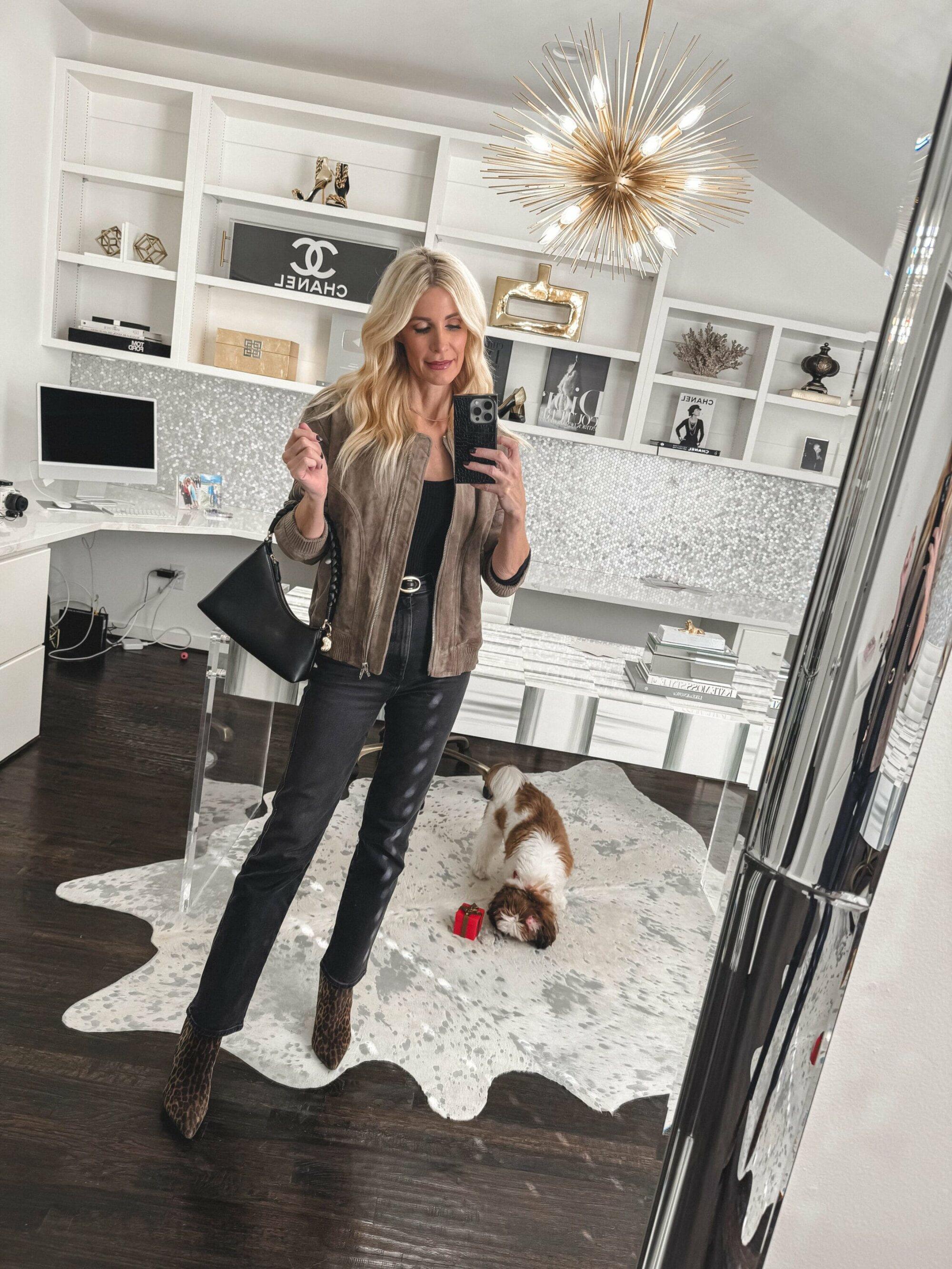 Dallas fashion blogger wearing a suede bomber jacket with the best selling pair of jeans from 2024 as one of 5 hottest looks on Instagram.