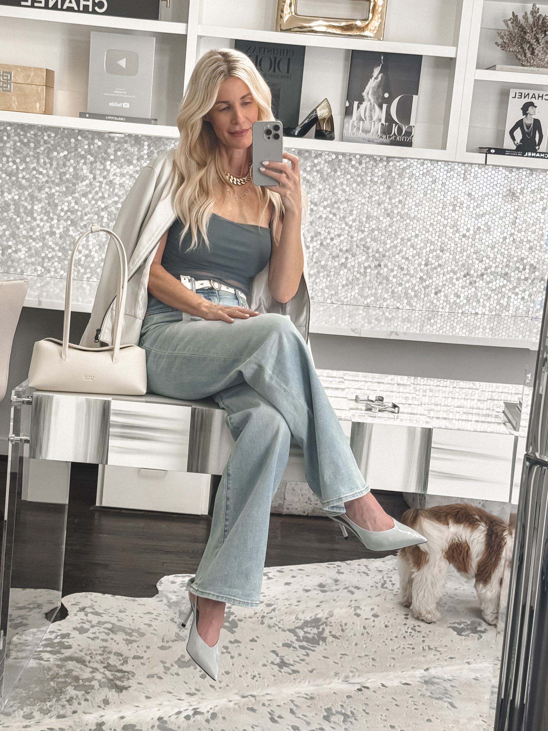 Over 40 Dallas fashion stylist for women over 40 wearing a pair of baby blue heels from Zara as one of the top 5 spring shoes of 2025.
