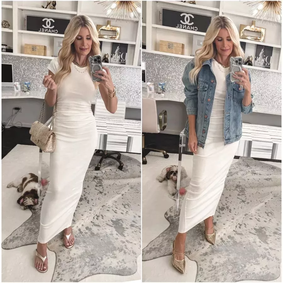 Over 40 Dallas fashion icon wearing a white maxi t-shirt dress with a oversized denim jacket as one 5 must-have maxi dresses.