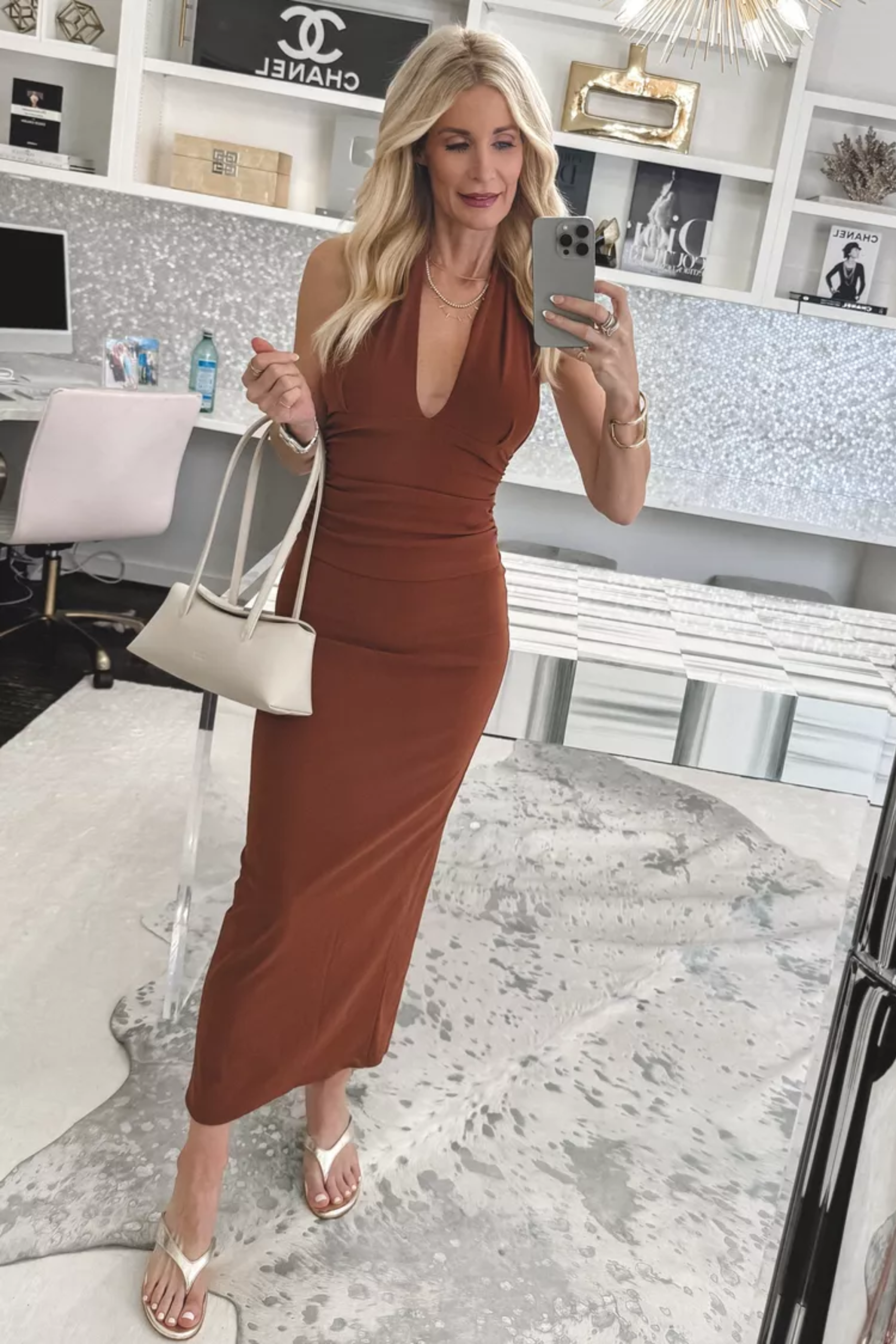 Over 40 Fashion stylist wearing comfortable kitten heels instead of sky high heels which are one of 5 shoe mistakes that will ruin your outfit.