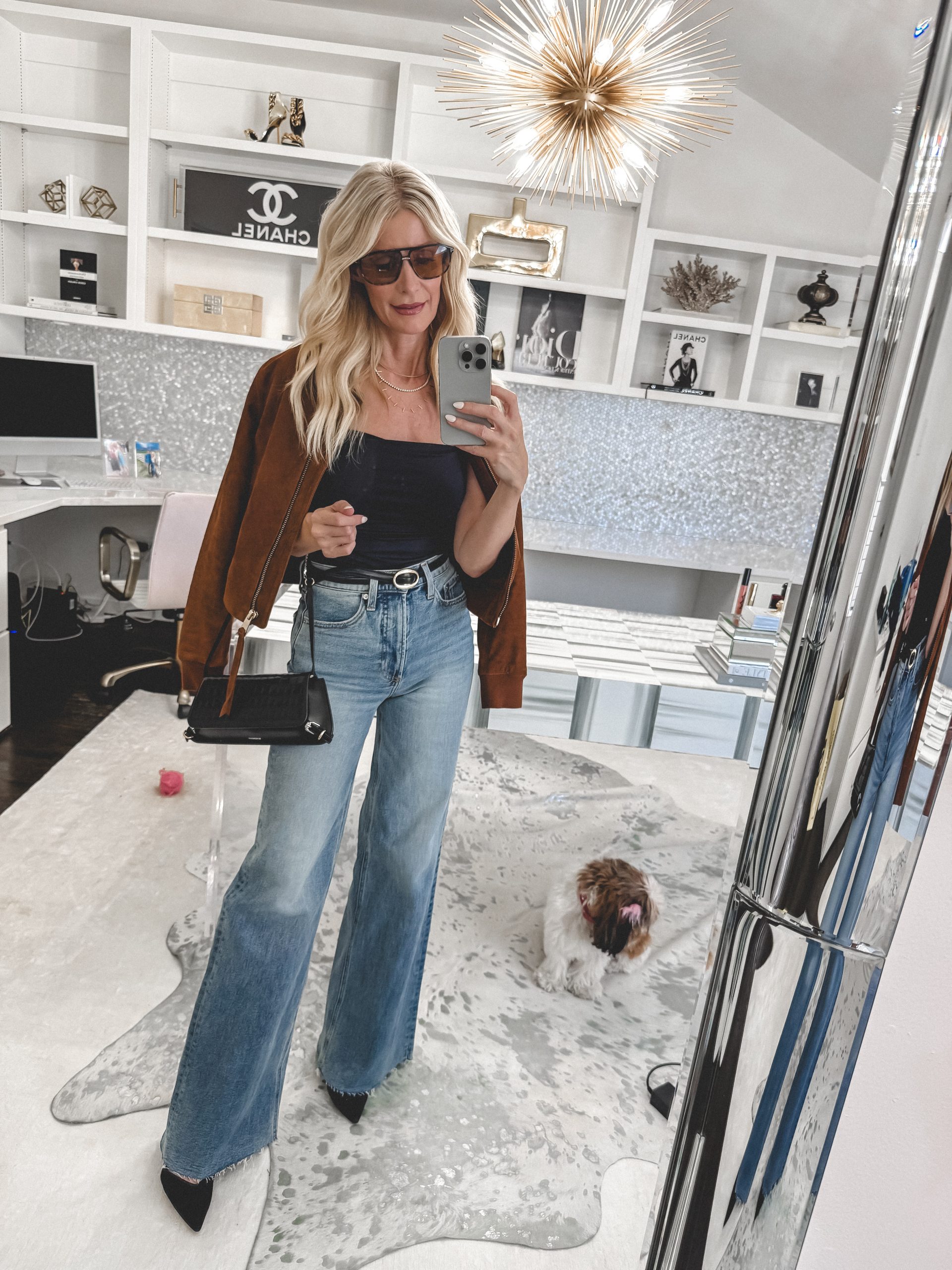 Dallas Fashion blogger wearing one of the best pairs of denim from the Nordstrom Anniversary Sale with a suede bomber jacket.