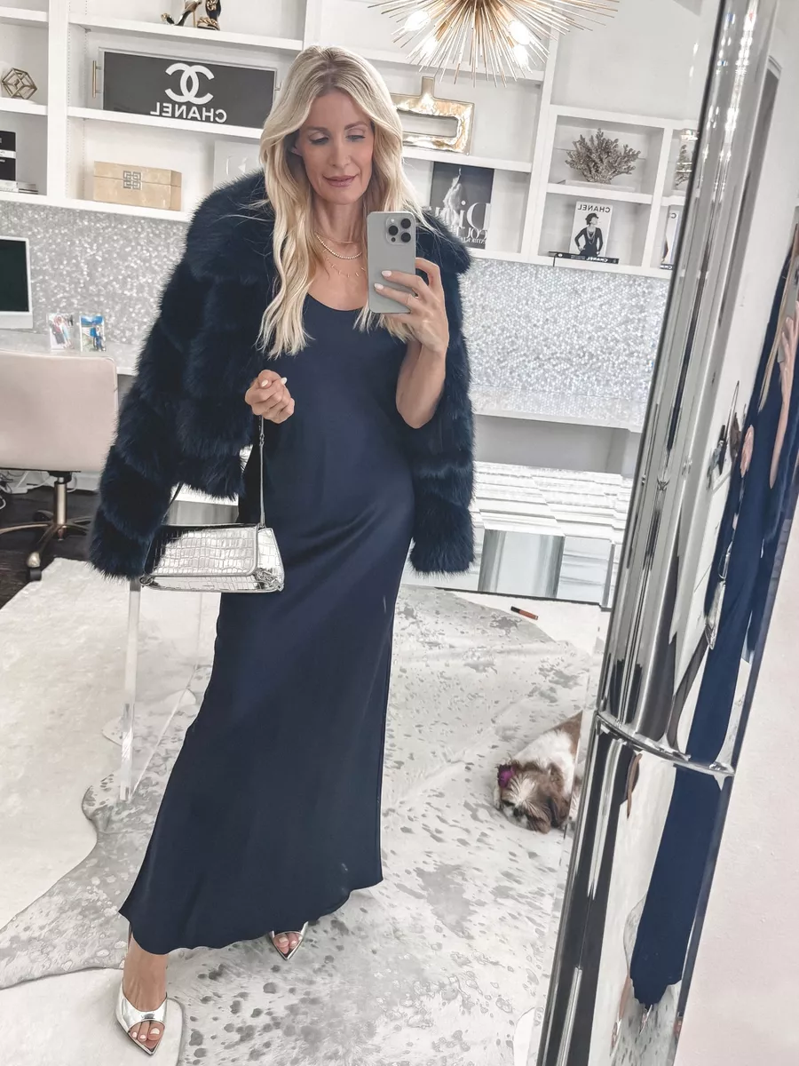Over 40 Dallas fashion blogger wearing a navy faux fur jacket that is one of 7 top-selling fall pieces.