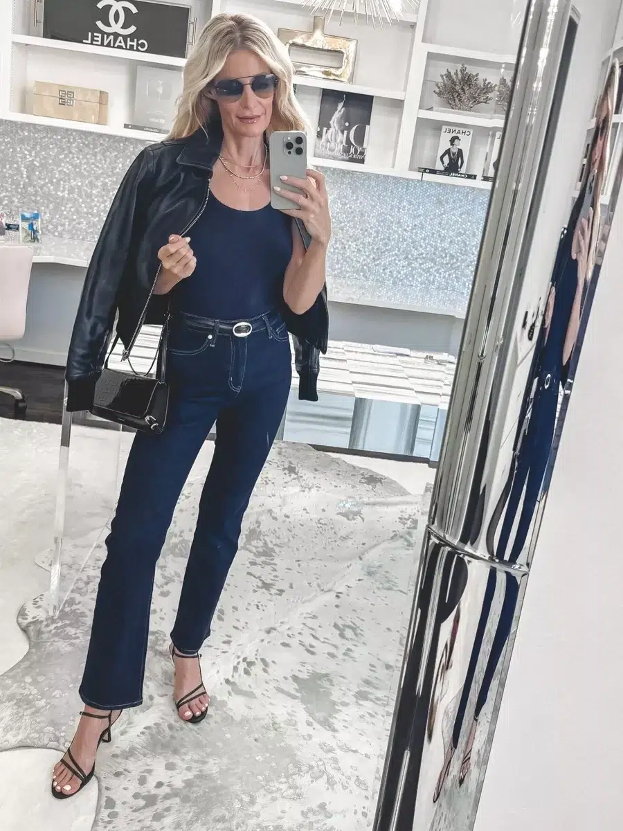 Over 40 fashion influencer wearing a pair of strappy heels which is one of 5 shoe trends for fall and winter 2025.