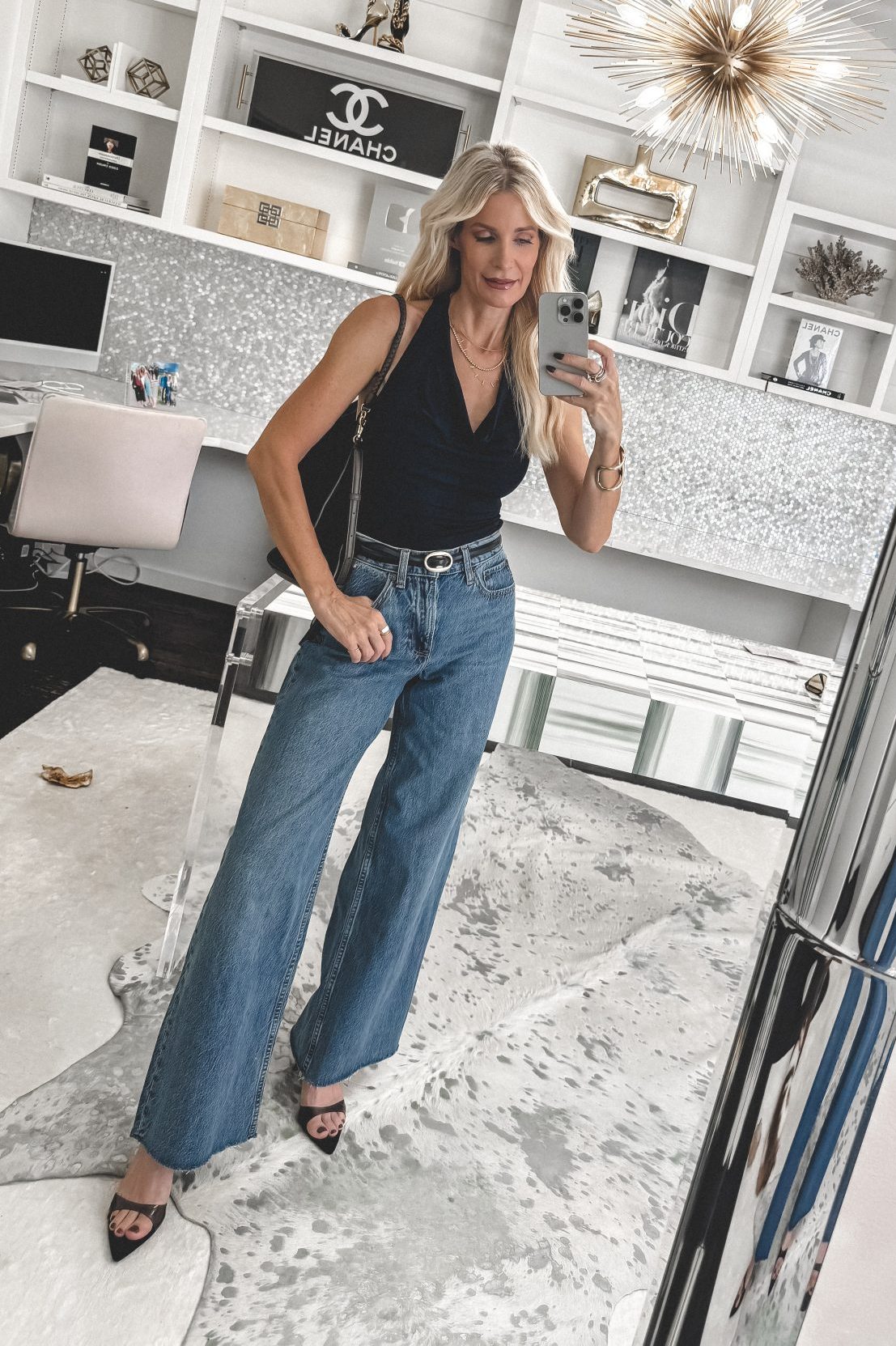 Dallas fashion blogger showcasing 7 style secrets for How to Style Wide Leg Jeans.