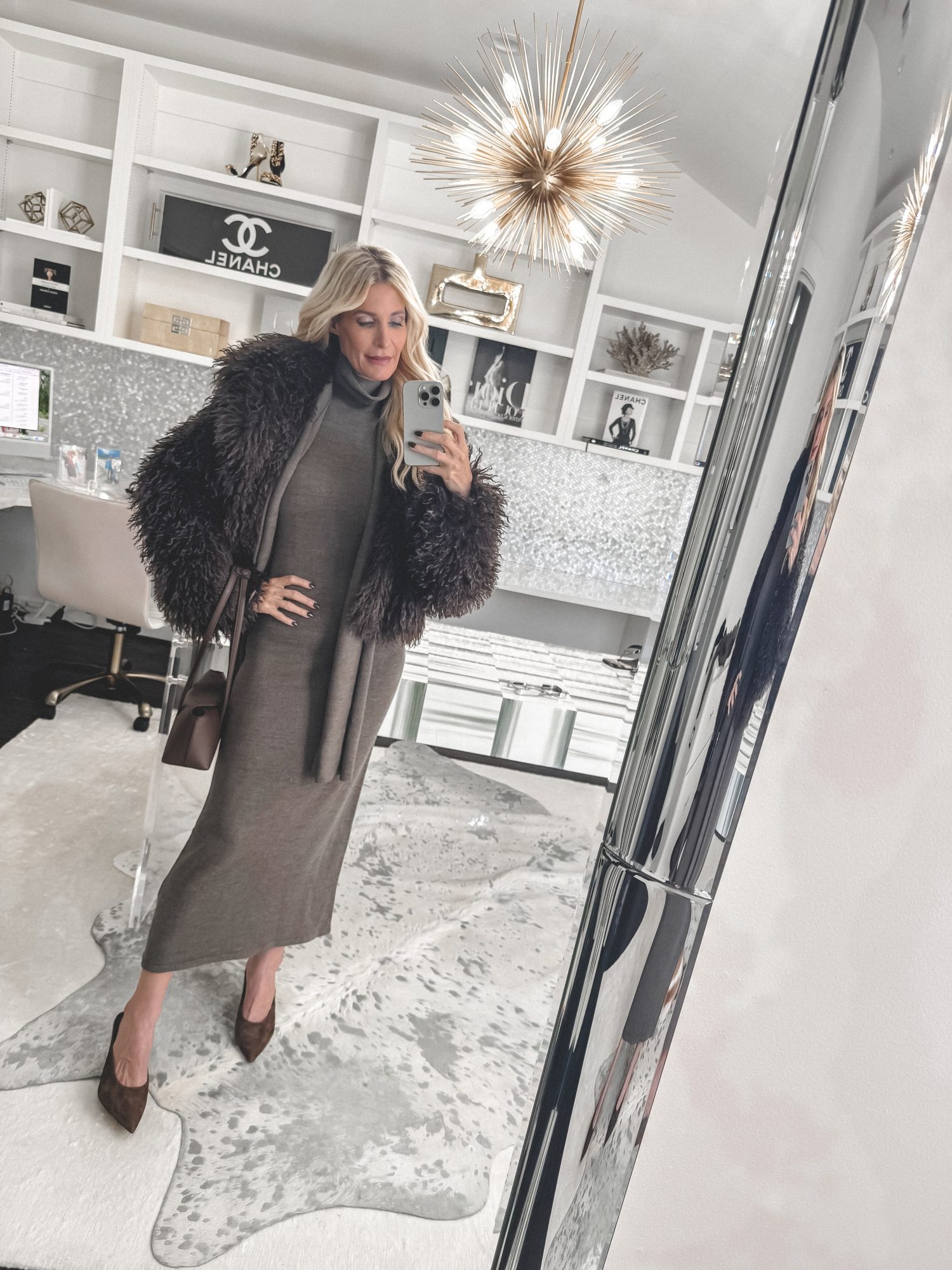 Over 40 fashion blogger wearing a formfitting dress instead of a loose fitting dress that would be one of 7 Items Women Over 40 Should Never Wear.