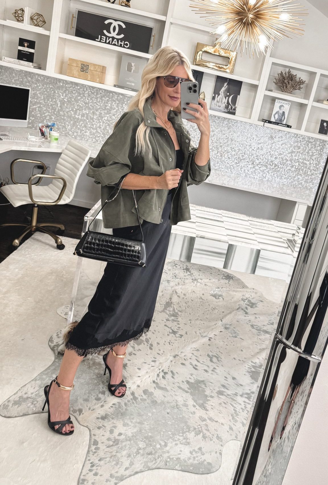 Over 40 fashion blogger wearing a chic updated jacket with lace trimmed skirt.