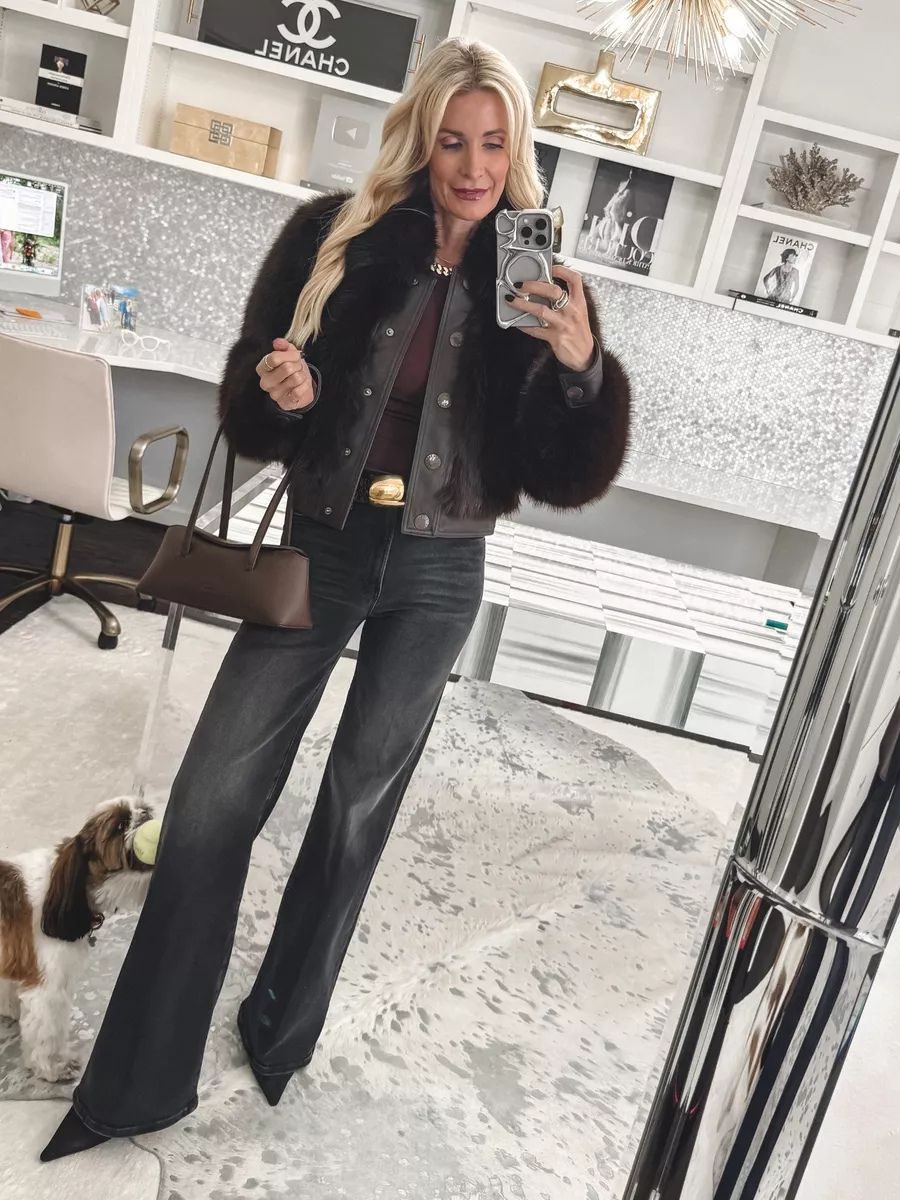 Over 40 fashion blogger from Dallas wearingm a faux fur shearling moto jacket with dark wash jeans and a croc embossed belt that are both luxury gift ideas for women over 40.