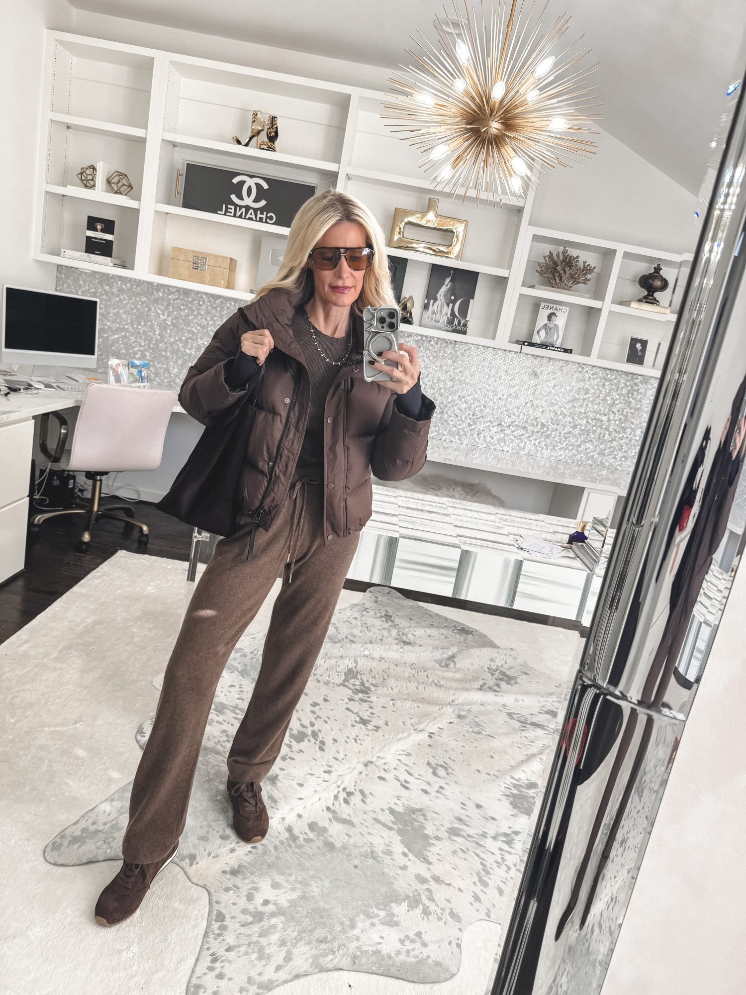 over 40 fashion blogger wearing elevated athleisure and sneakers as one of the 8 Fashion Trends That Look Expensive But Aren’t.