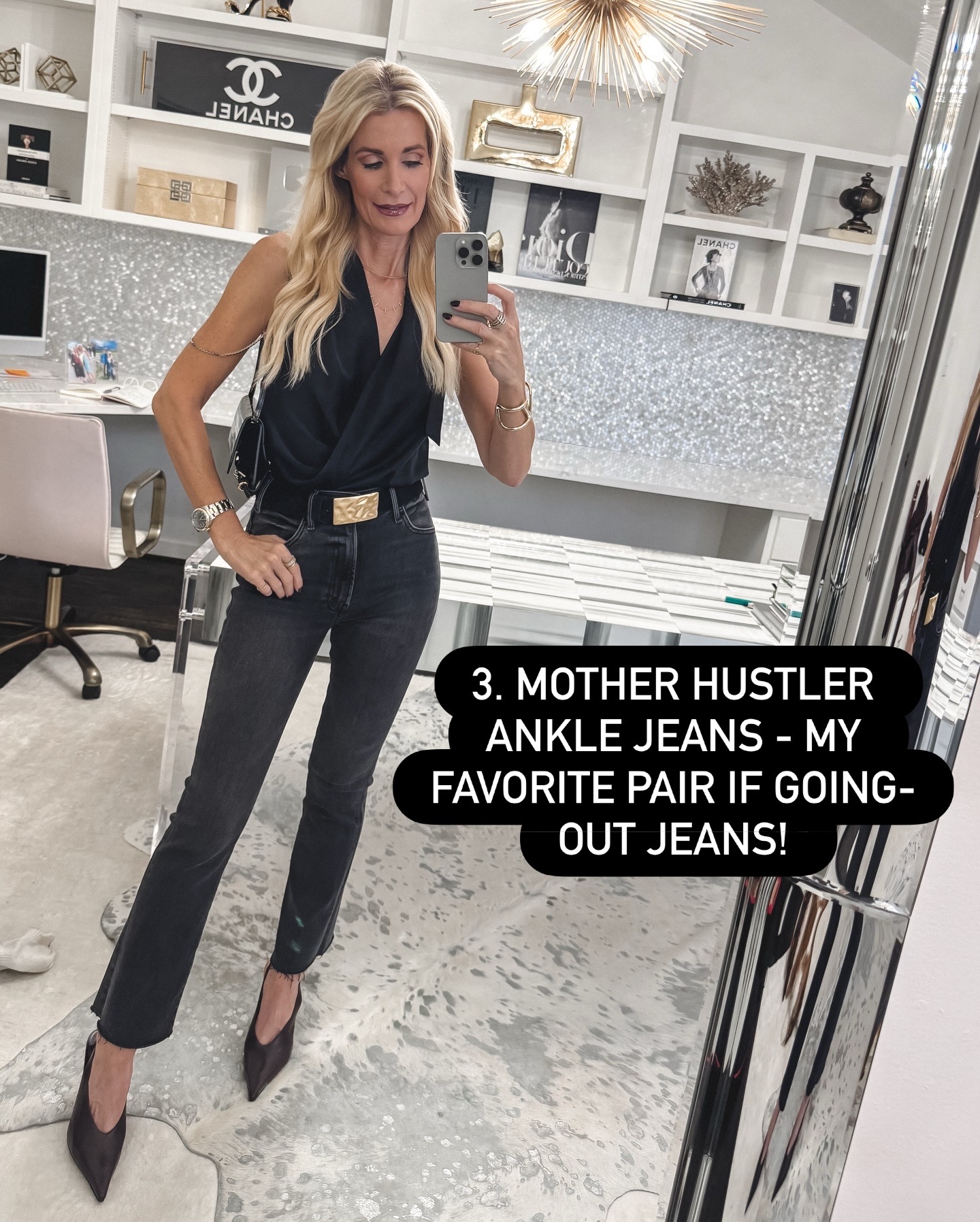 over 40 fashion blogger wearing faded black Mother Hustler ankle jeans styled for a night-out look, a top example of best-selling fashion pieces of 2025.