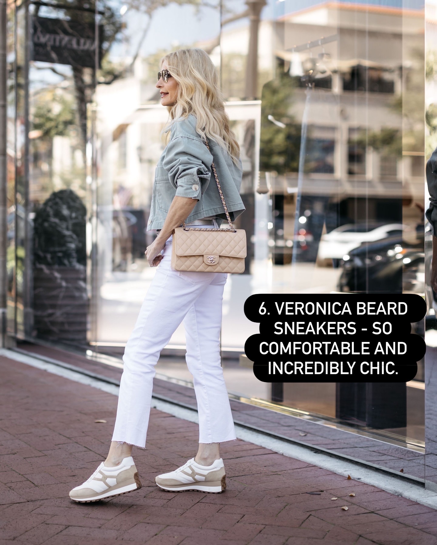 Dallas fashion stylist for women over 40 wearing Veronica Beard sneakers styled casually with white jeans, a chic everyday shoe loved by women over 40.