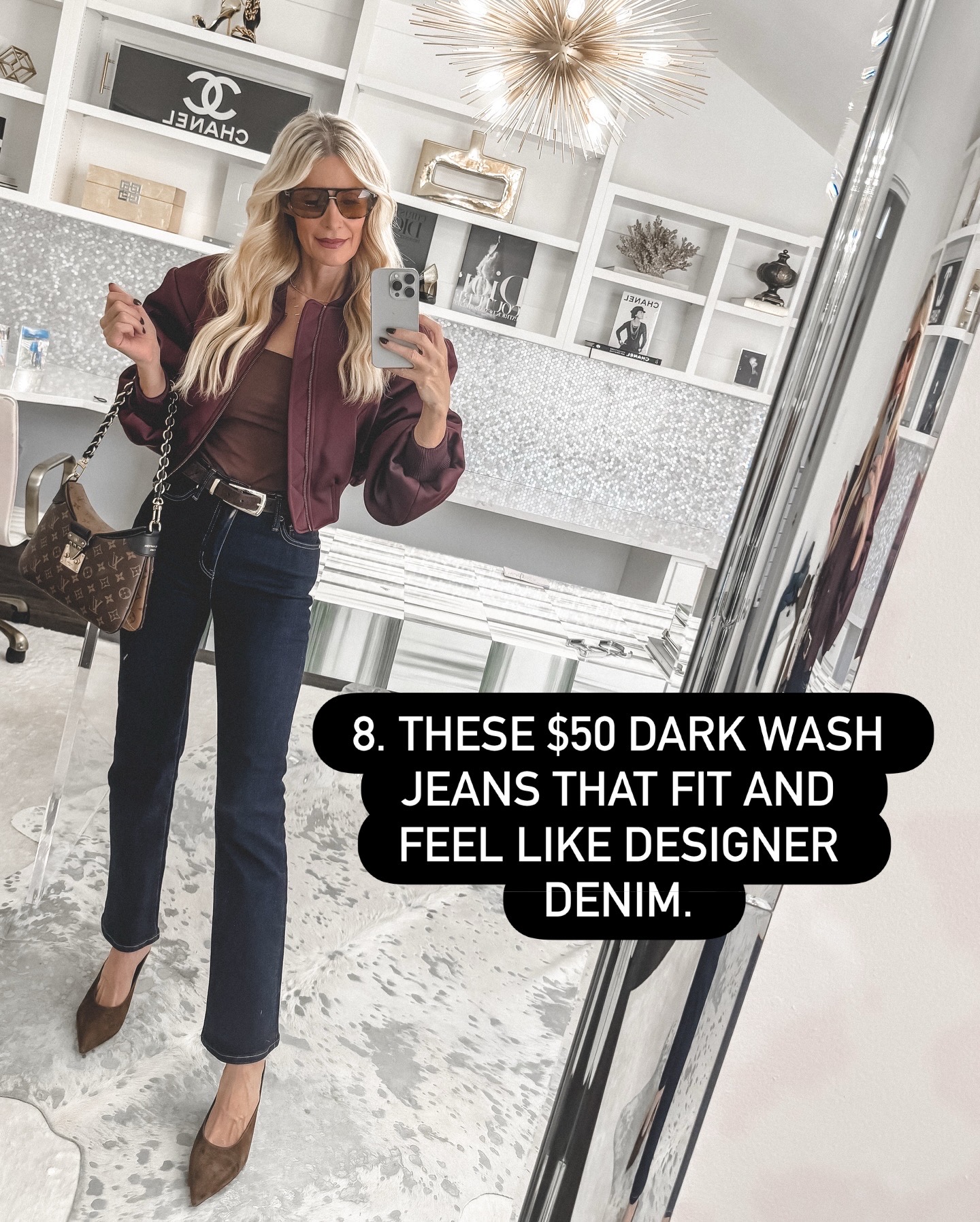 Heather Anderson wearing Quince dark wash jeans that fit like designer denim, one of the best-selling fashion pieces of 2025 at an affordable price.