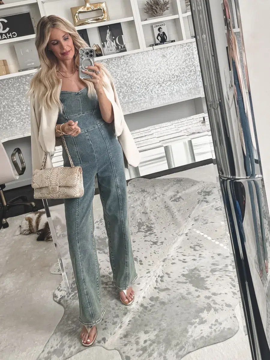 Fashion stylist for women over 40 wearing a denim jumpsuit with simple gold kitten heels as what to wear instead of one of the Shoe Trends Out of Style 2026.