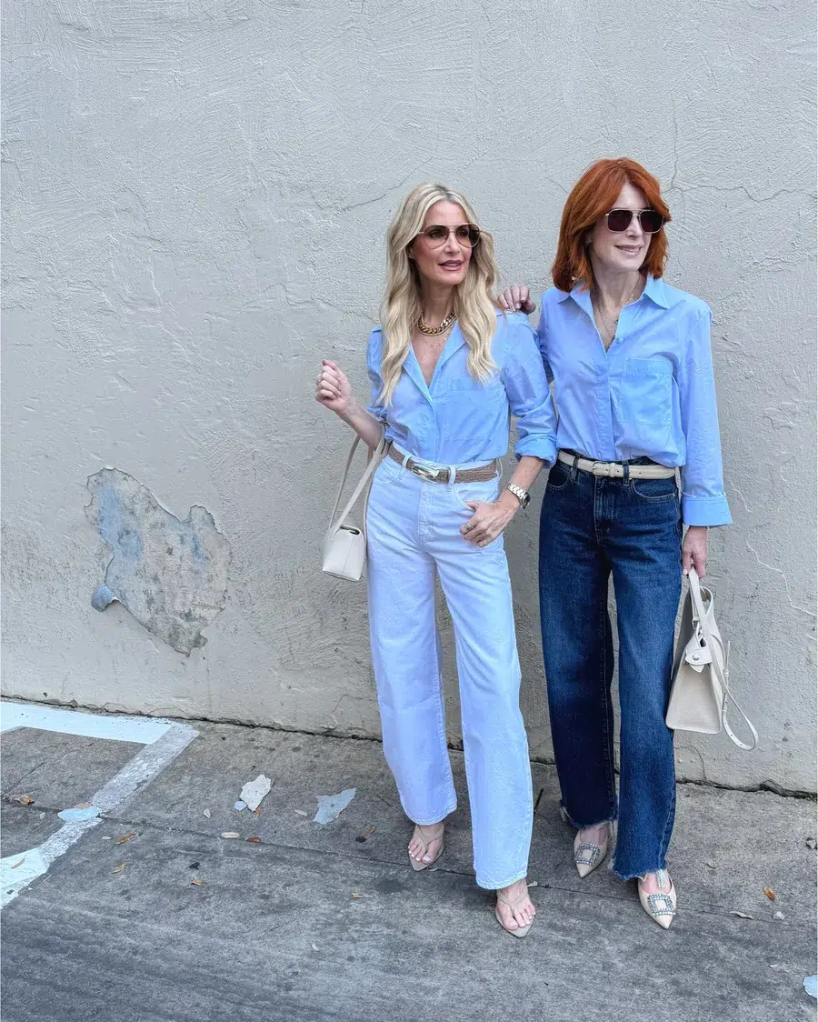 2 over 50 fashion bloggers showcasing full length jeans that elongate your legs instead of oddly cropped jeans that are one of 7 style mistakes making you look older.