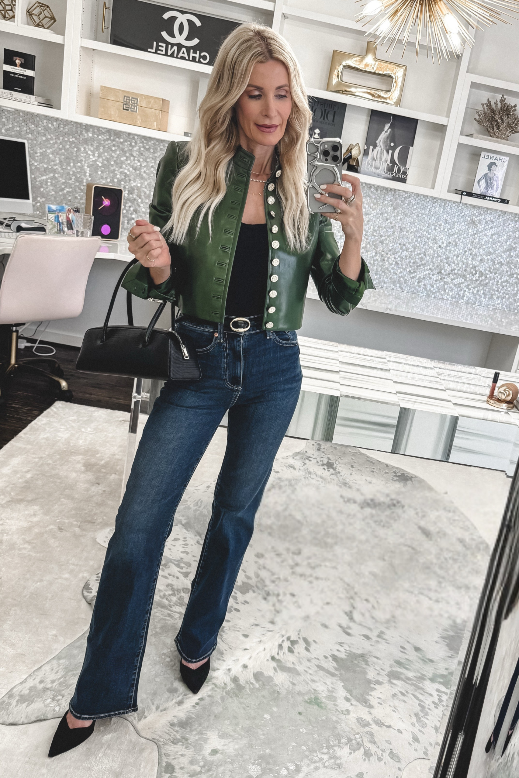 Fashion influencer for women over 40 wearing her favorite forest green leather jacket as one of 10 NSALE Finds Still in Stock.