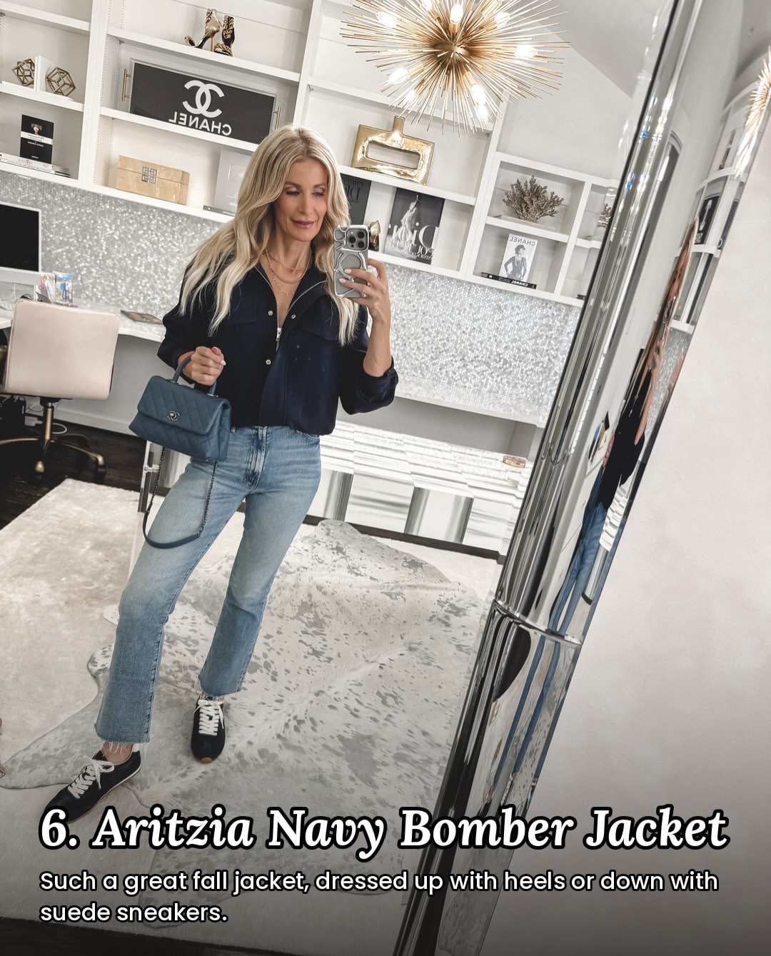 Over 40 blogger for fashion wearing a navy bomber jacket as one of 10 casual fall outfits.
