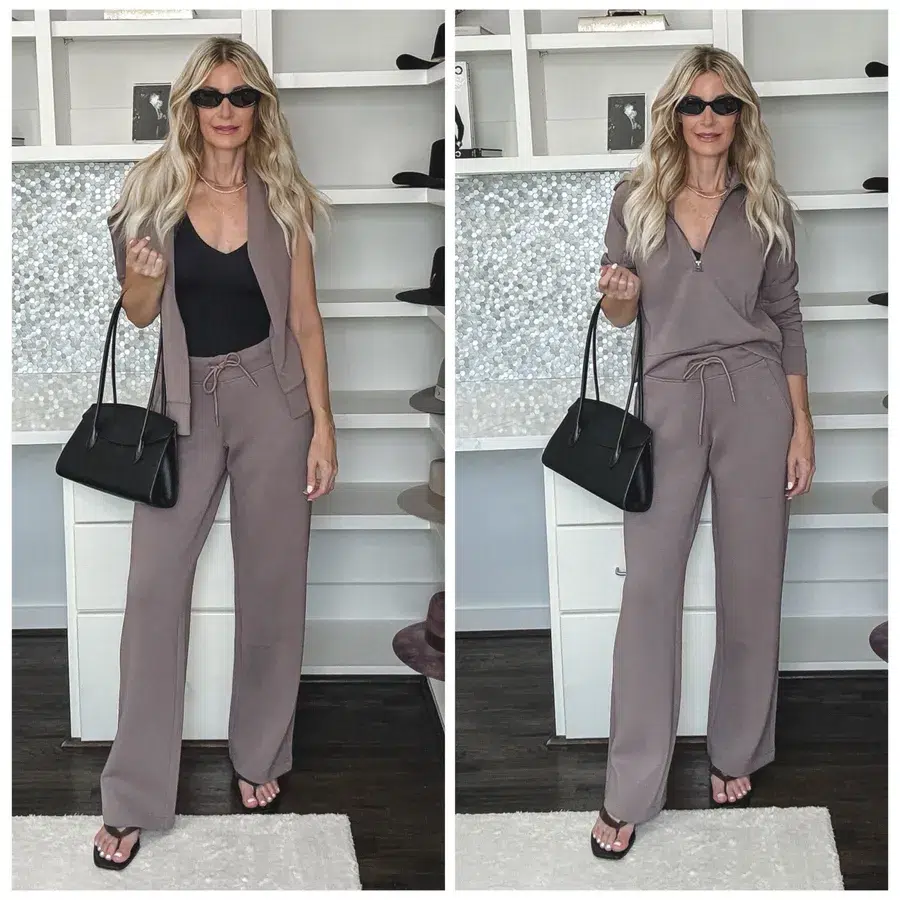 Over 40 fashion blogger styling a taupe CloudComfort matching set with wide-leg pants, a black tank, half-zip sweatshirt, and black accessories as one of 7 fall outfits from Quince.